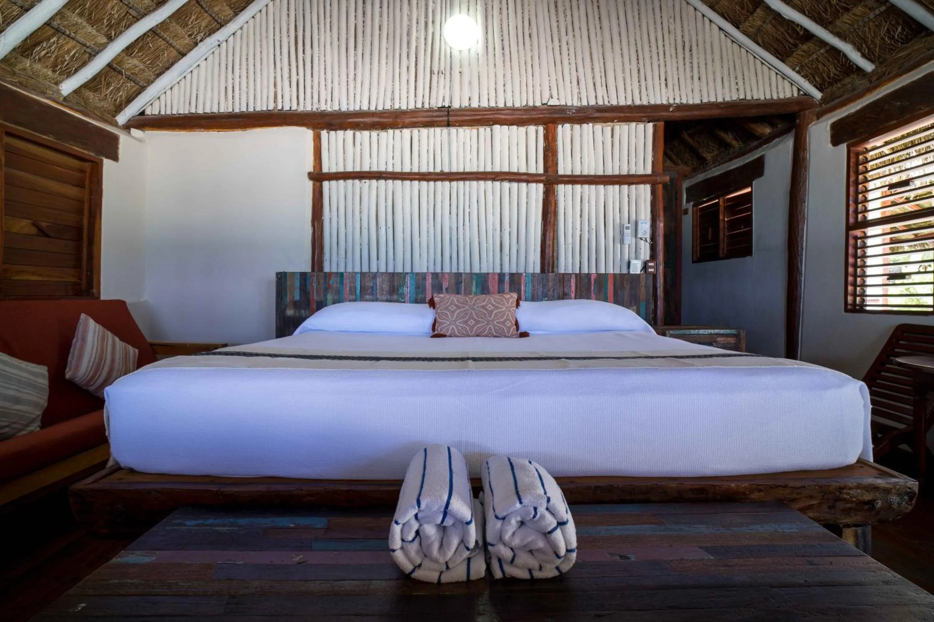 Bed in BT Live Tulum located at the party zone