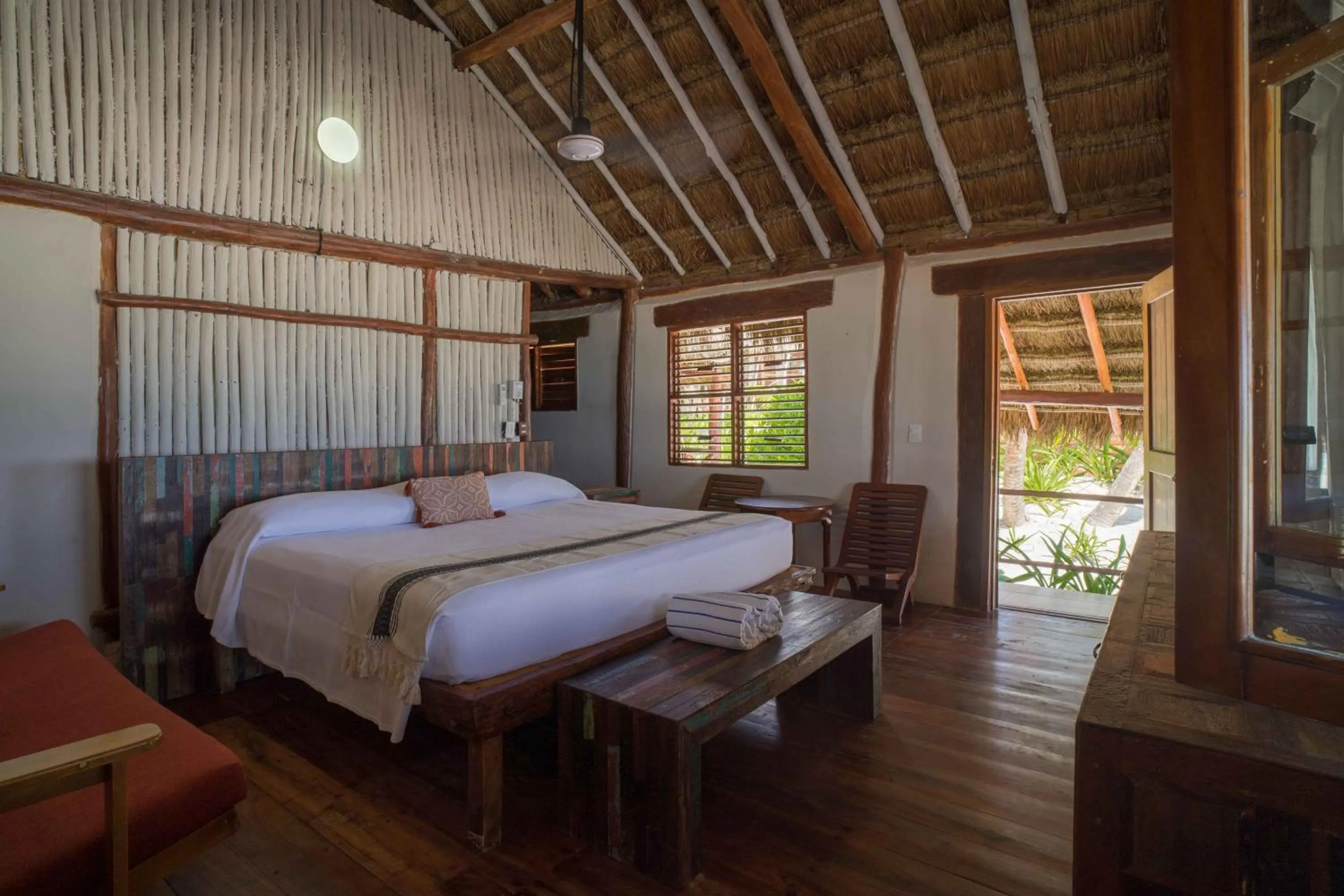 Bed in BT Live Tulum located at the party zone