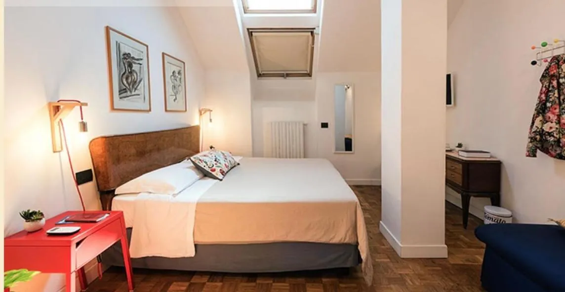 Bed in Mansarda Bellini 84