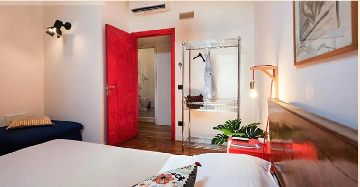 Bed in Mansarda Bellini 84