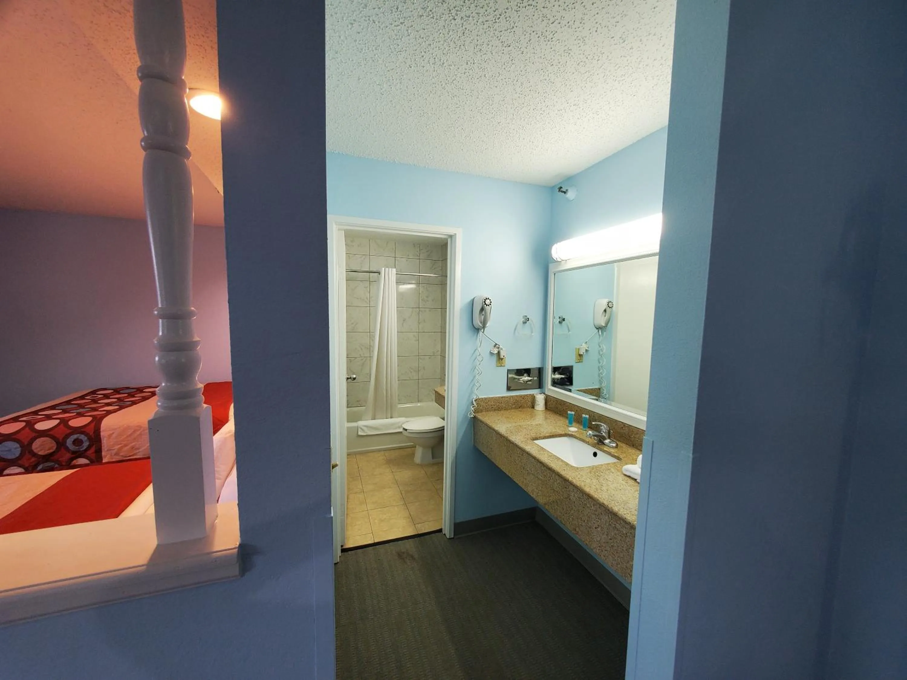 Bathroom, Bed in Coastal Inn & Suites