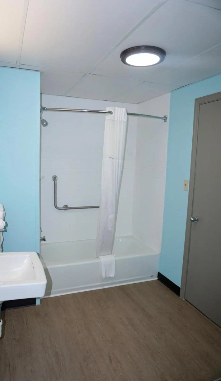 Bathroom in Days Inn by Wyndham Augusta Wheeler Road