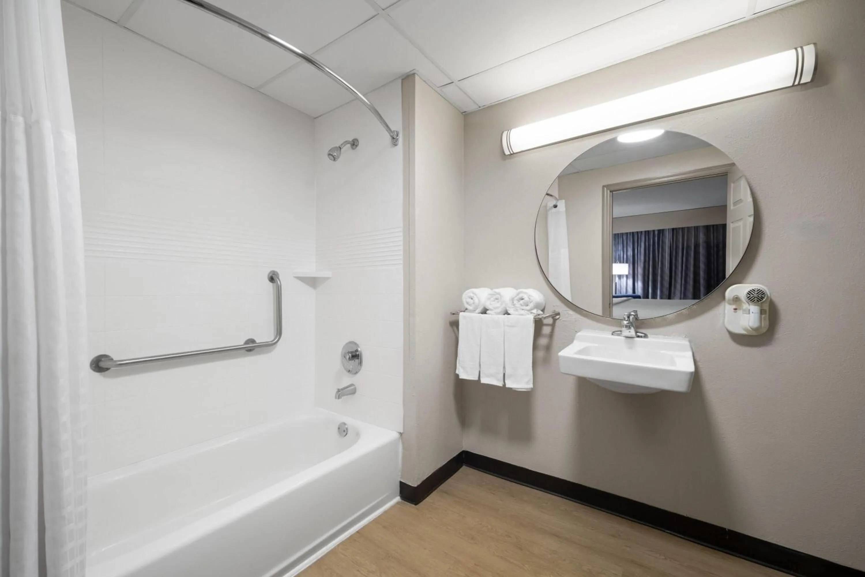 Bathroom in Days Inn by Wyndham Augusta Wheeler Road