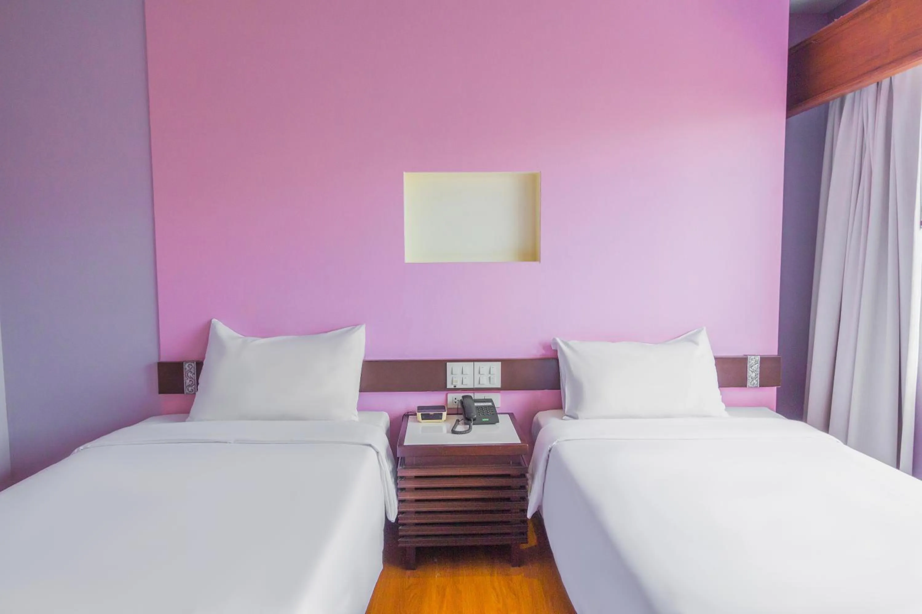 Bed in Mayflower Grande Chiang Mai