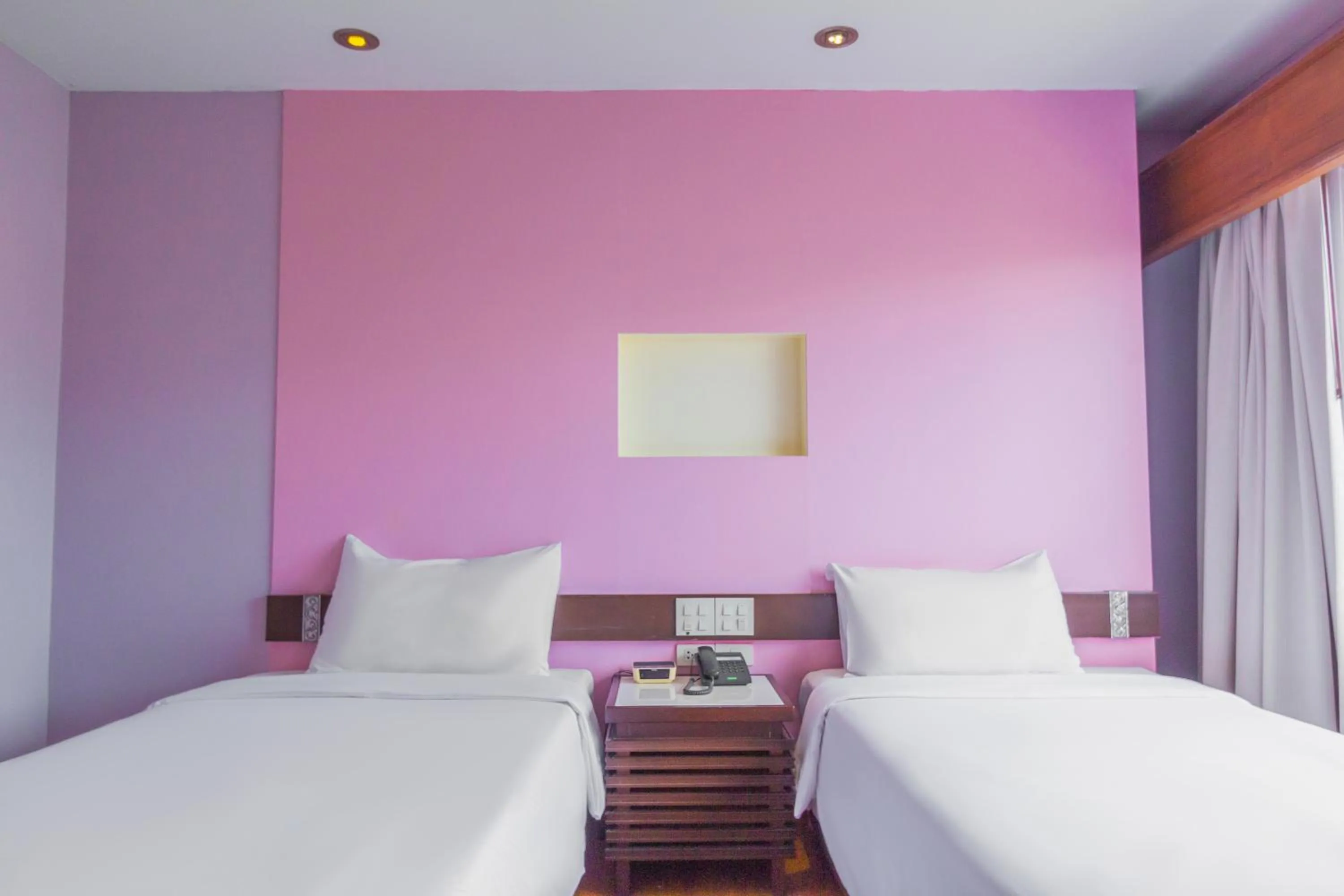 Bed in Mayflower Grande Chiang Mai