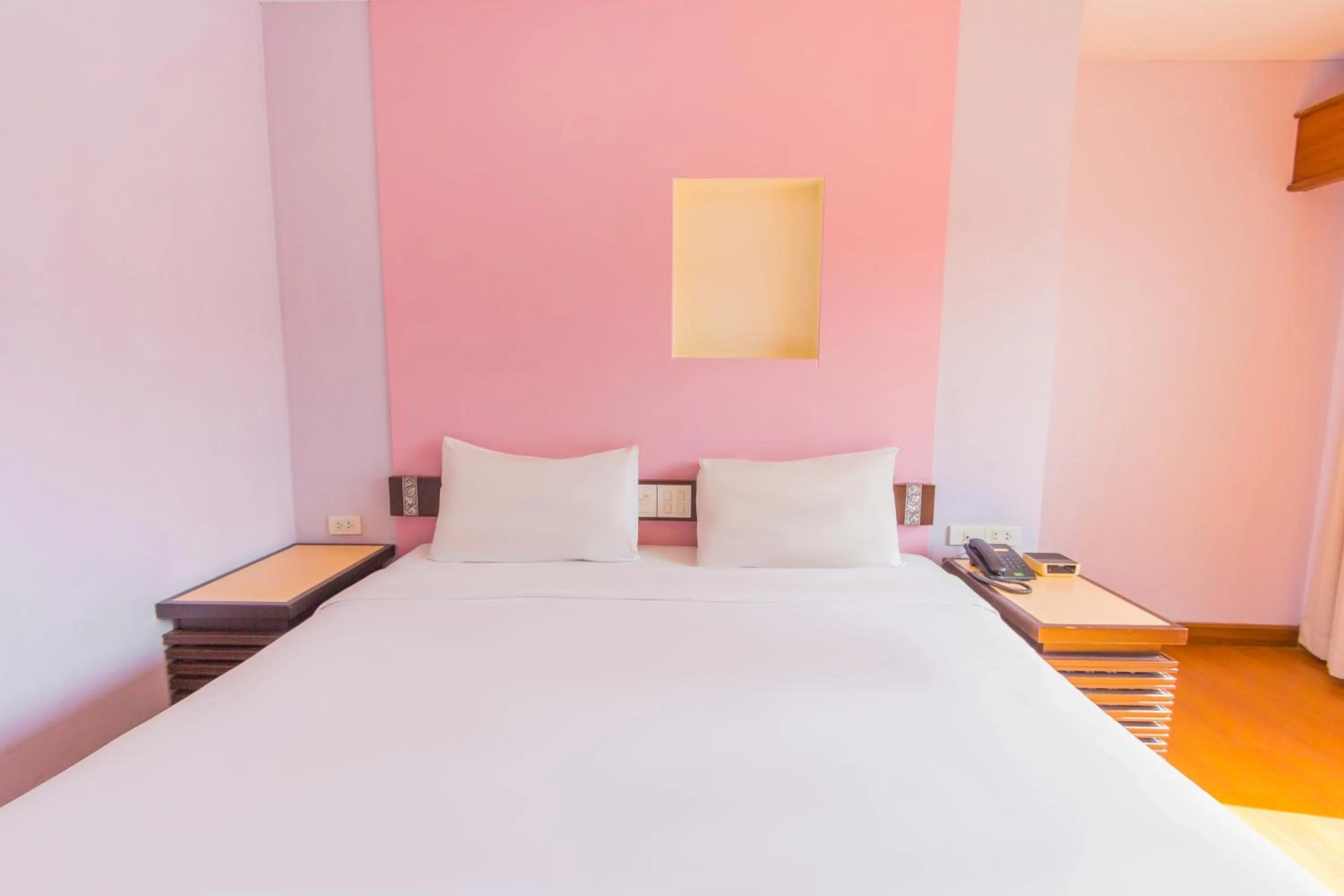 Bed in Mayflower Grande Chiang Mai