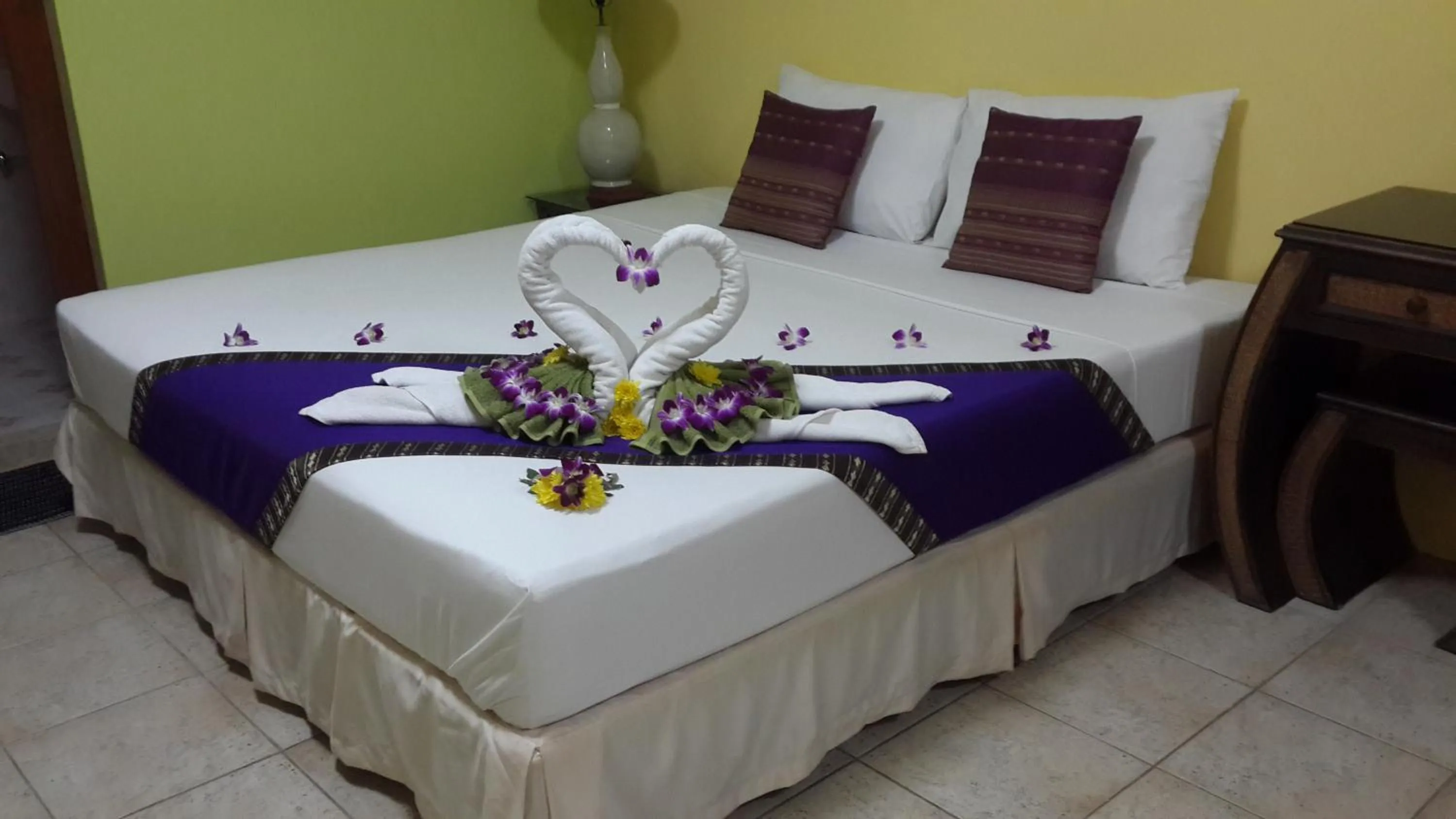 Decorative detail, Bed in Chez Charly Bungalow