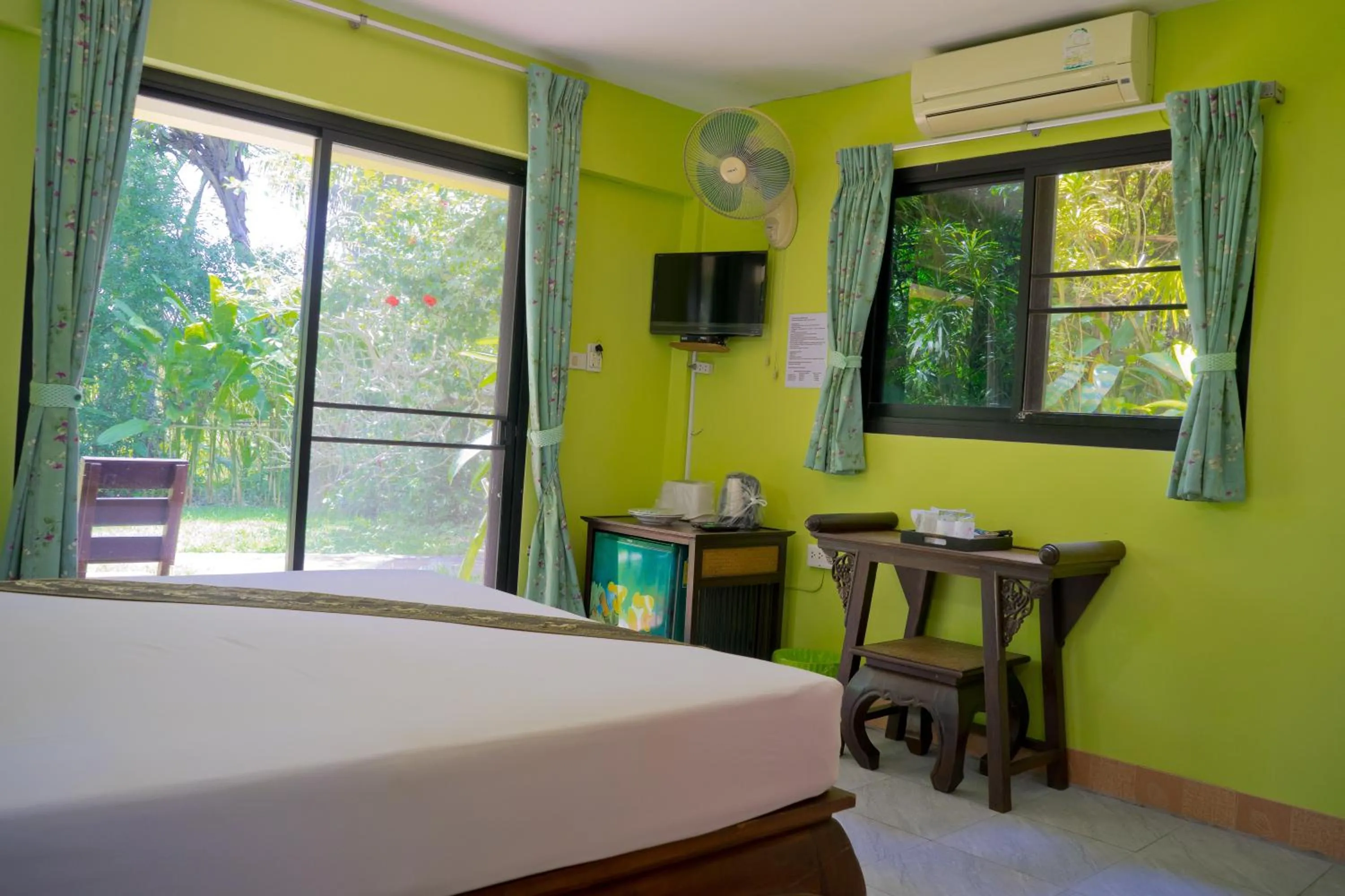 Bedroom, Bed in Chez Charly Bungalow