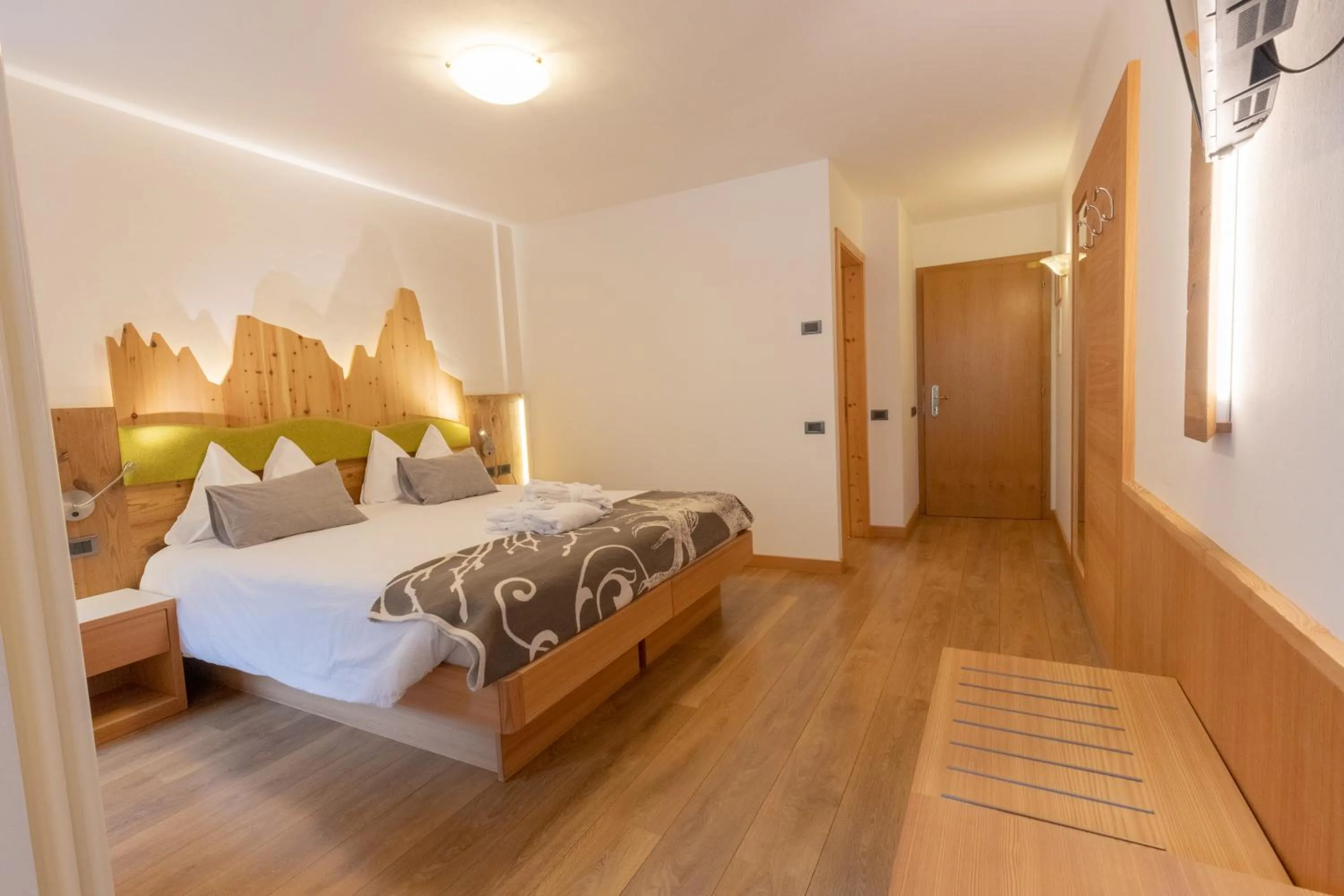 Bed in Berghotel Miramonti