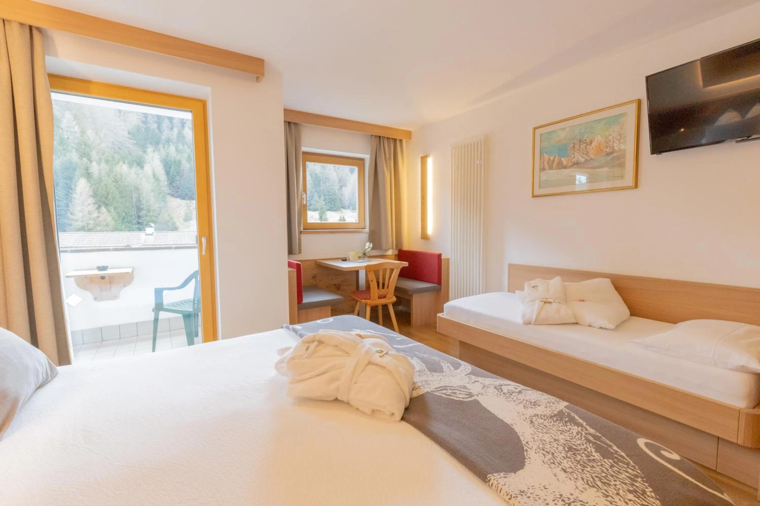 Bed in Berghotel Miramonti