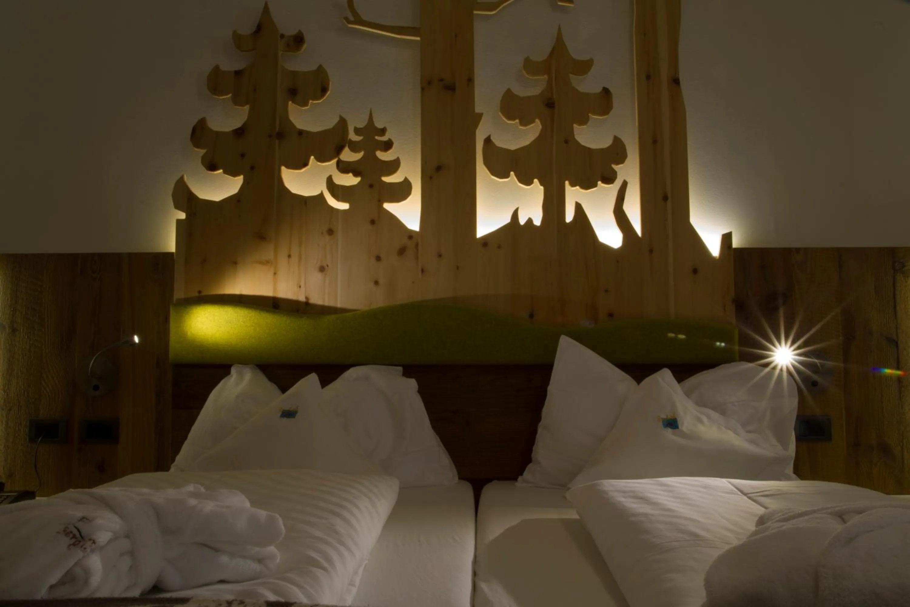 Bed in Berghotel Miramonti