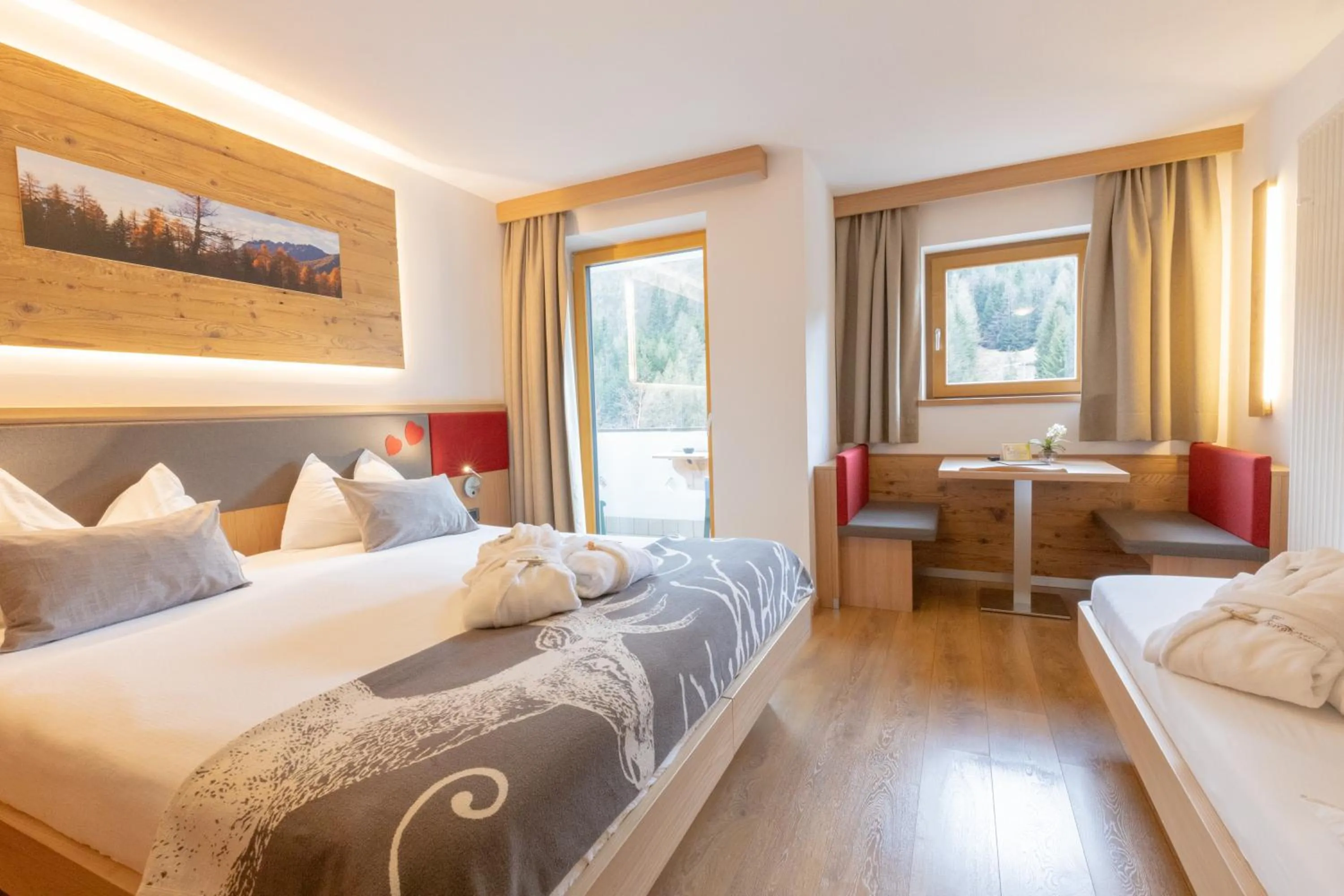 Bed in Berghotel Miramonti