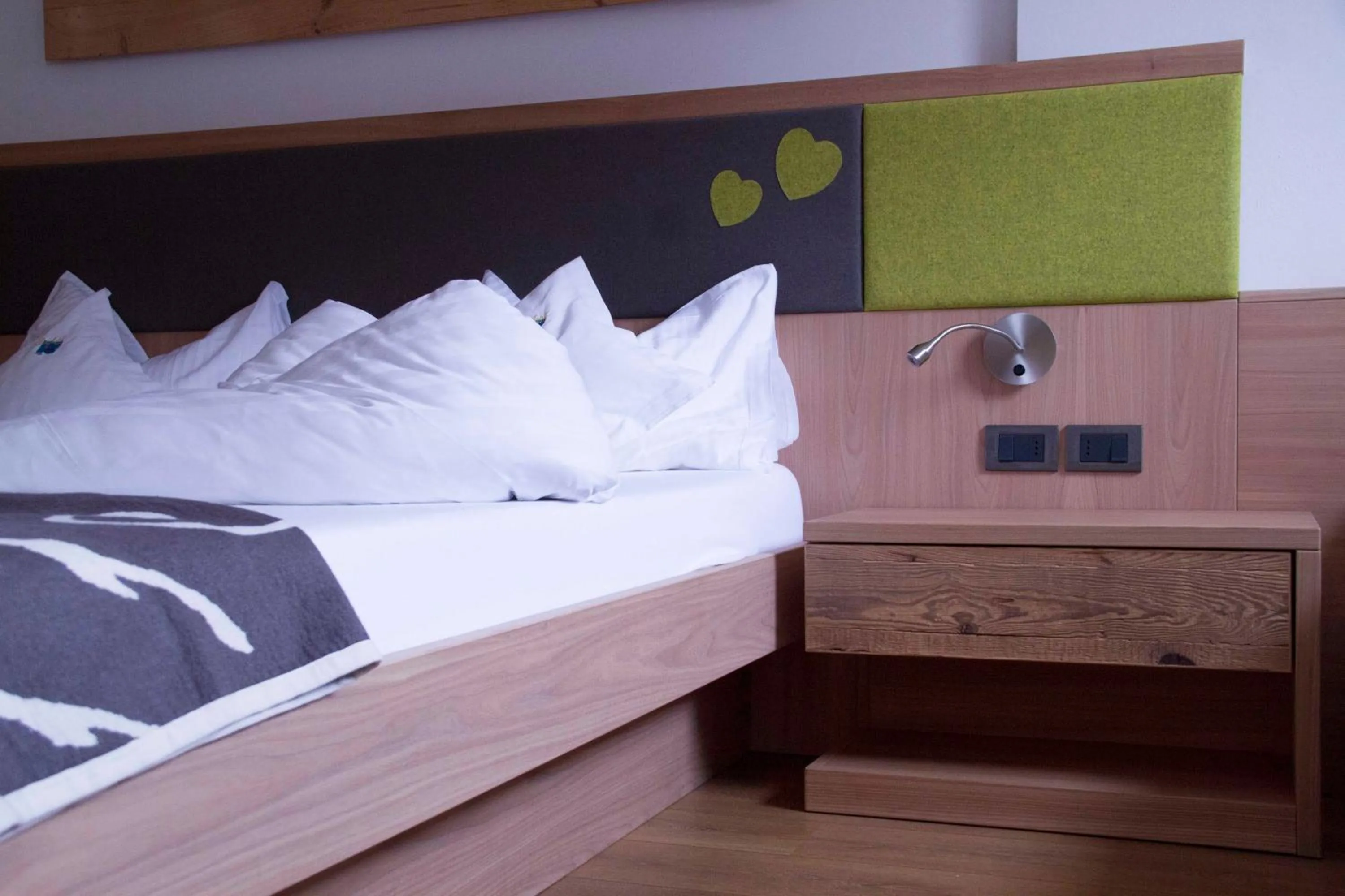 Bed in Berghotel Miramonti