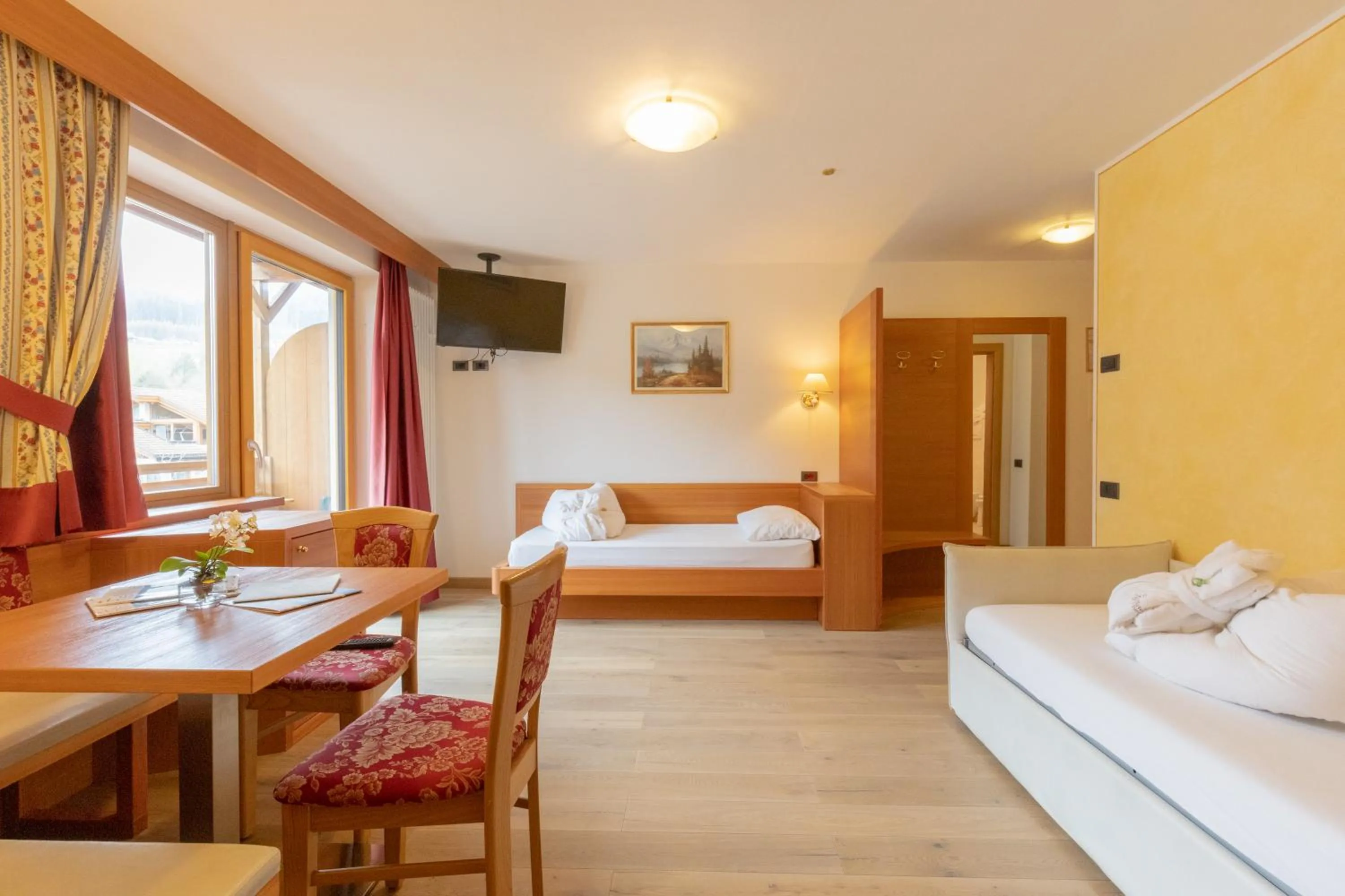 Bed in Berghotel Miramonti