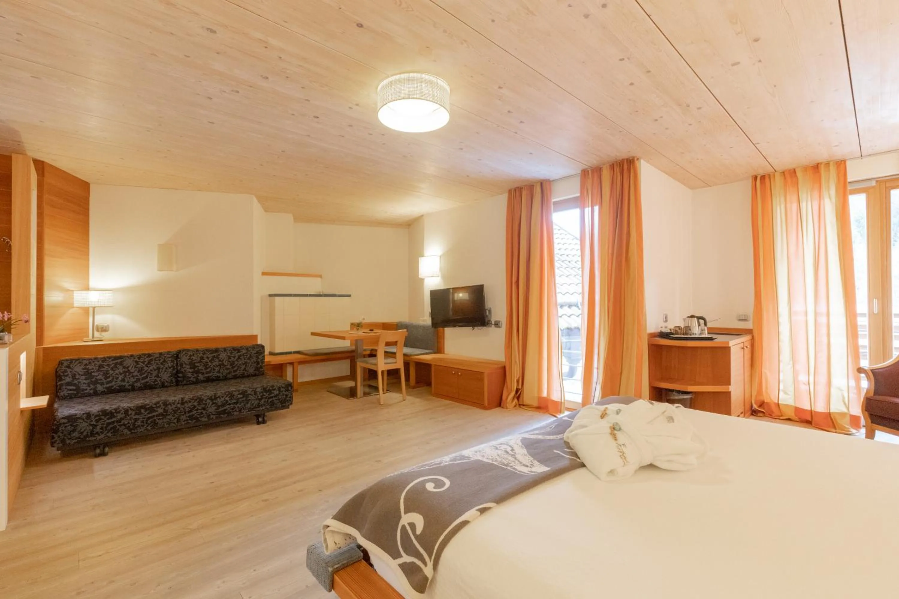 Bed in Berghotel Miramonti