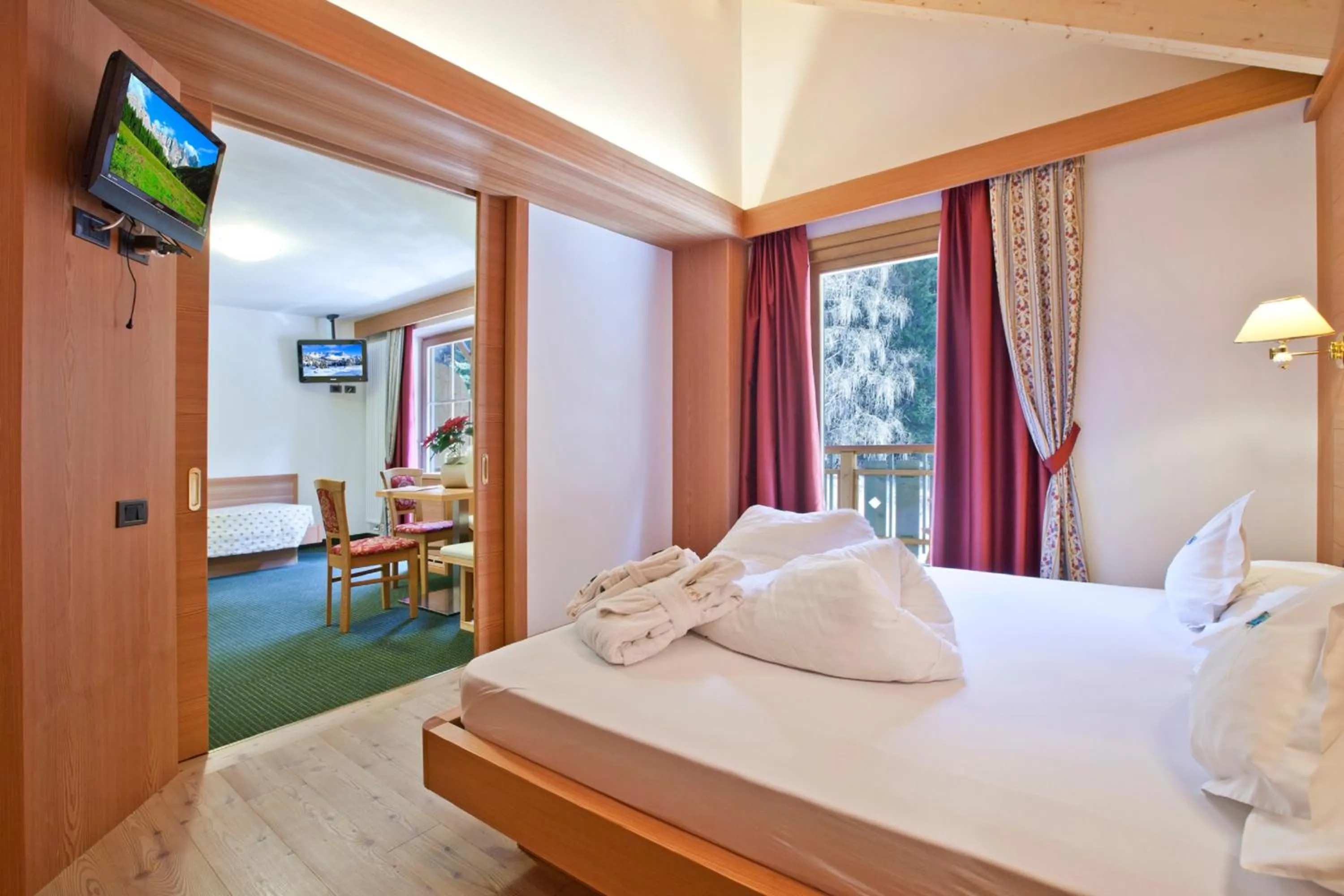 Bed in Berghotel Miramonti