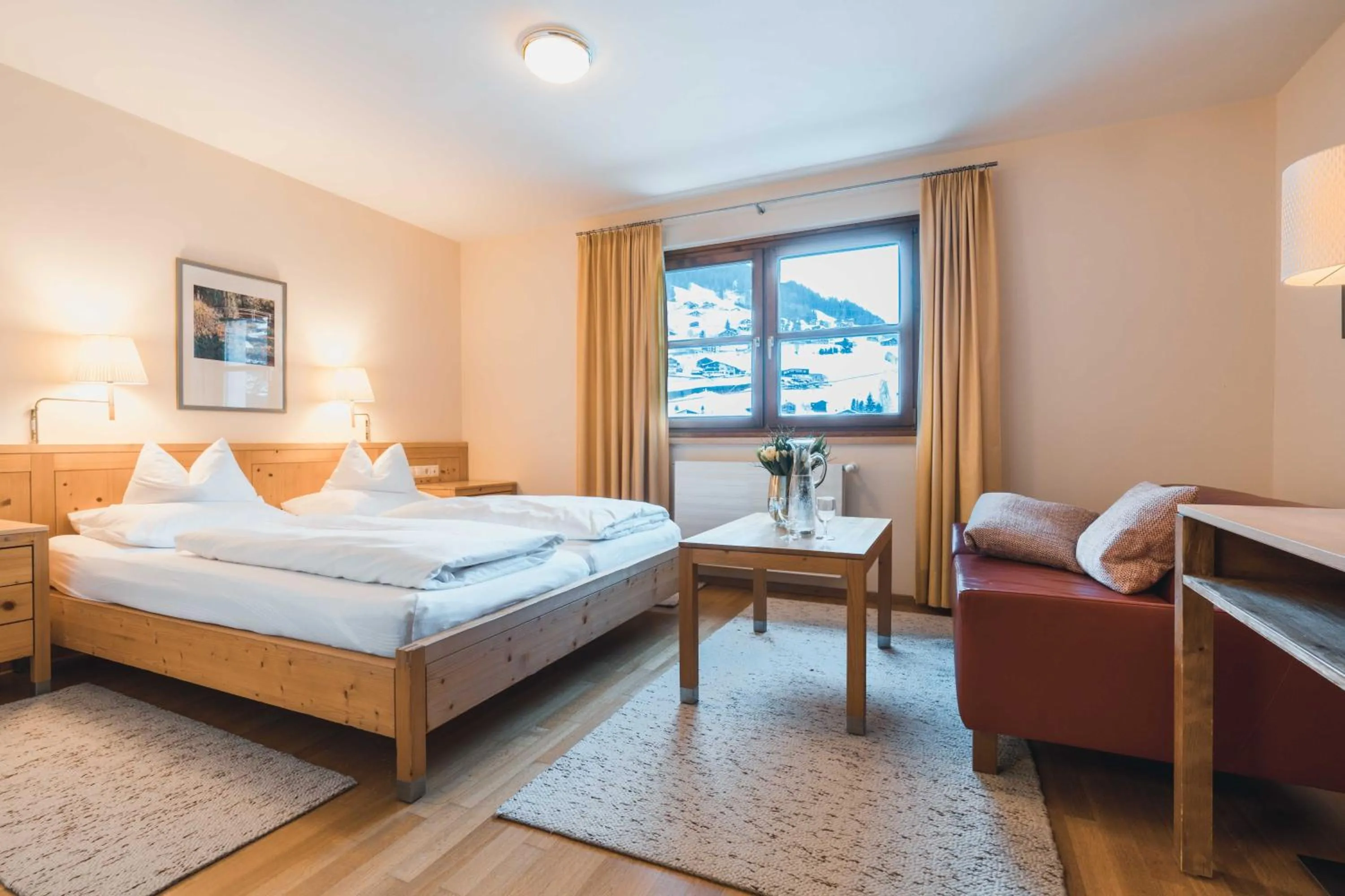 Photo of the whole room, Bed in Felbermayer Hotel & AlpineSpa-Montafon