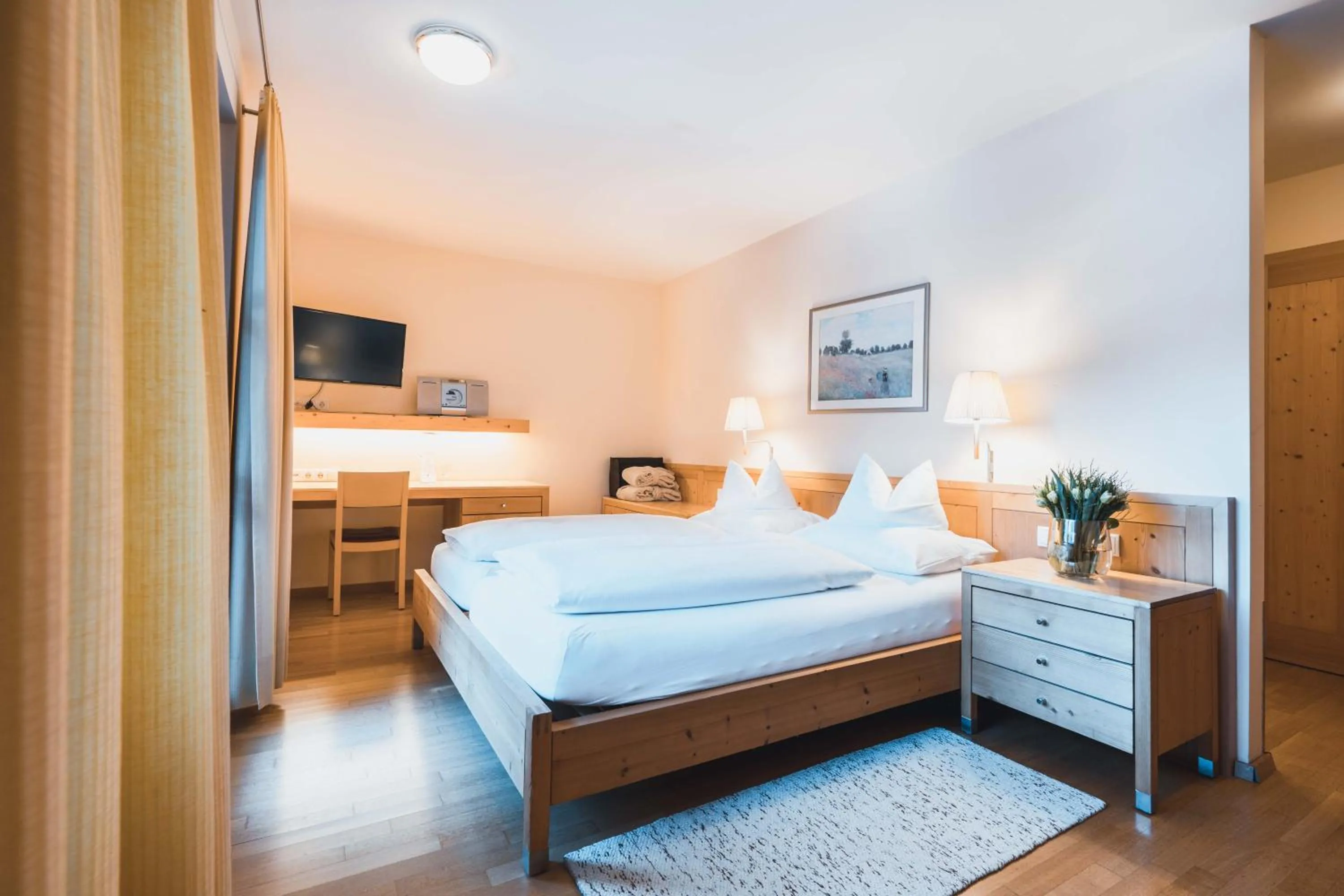 Photo of the whole room, Bed in Felbermayer Hotel & AlpineSpa-Montafon