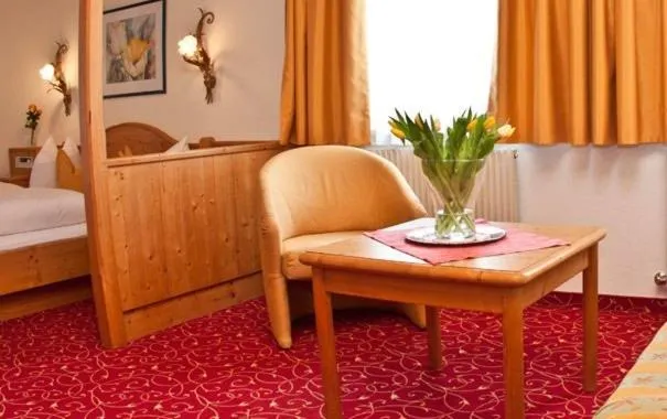 Seating area, Bed in Hotel Garni Pra Posta