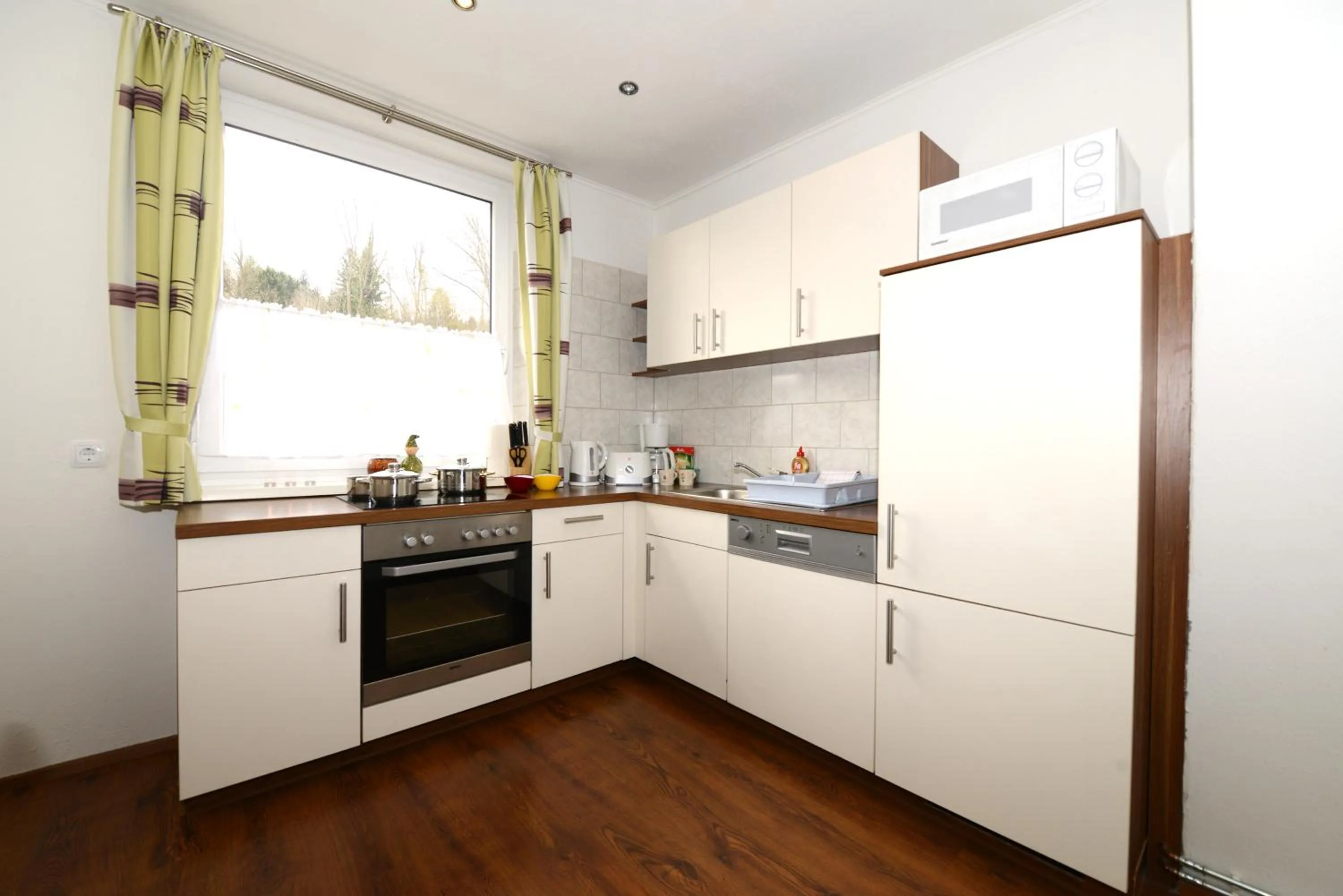 Kitchen or kitchenette in Hotel-Restaurant Kirchenwirt Aigen