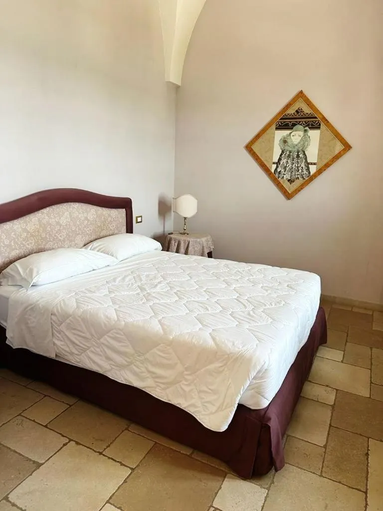 Bed in Hotel Saraceno Al Faro