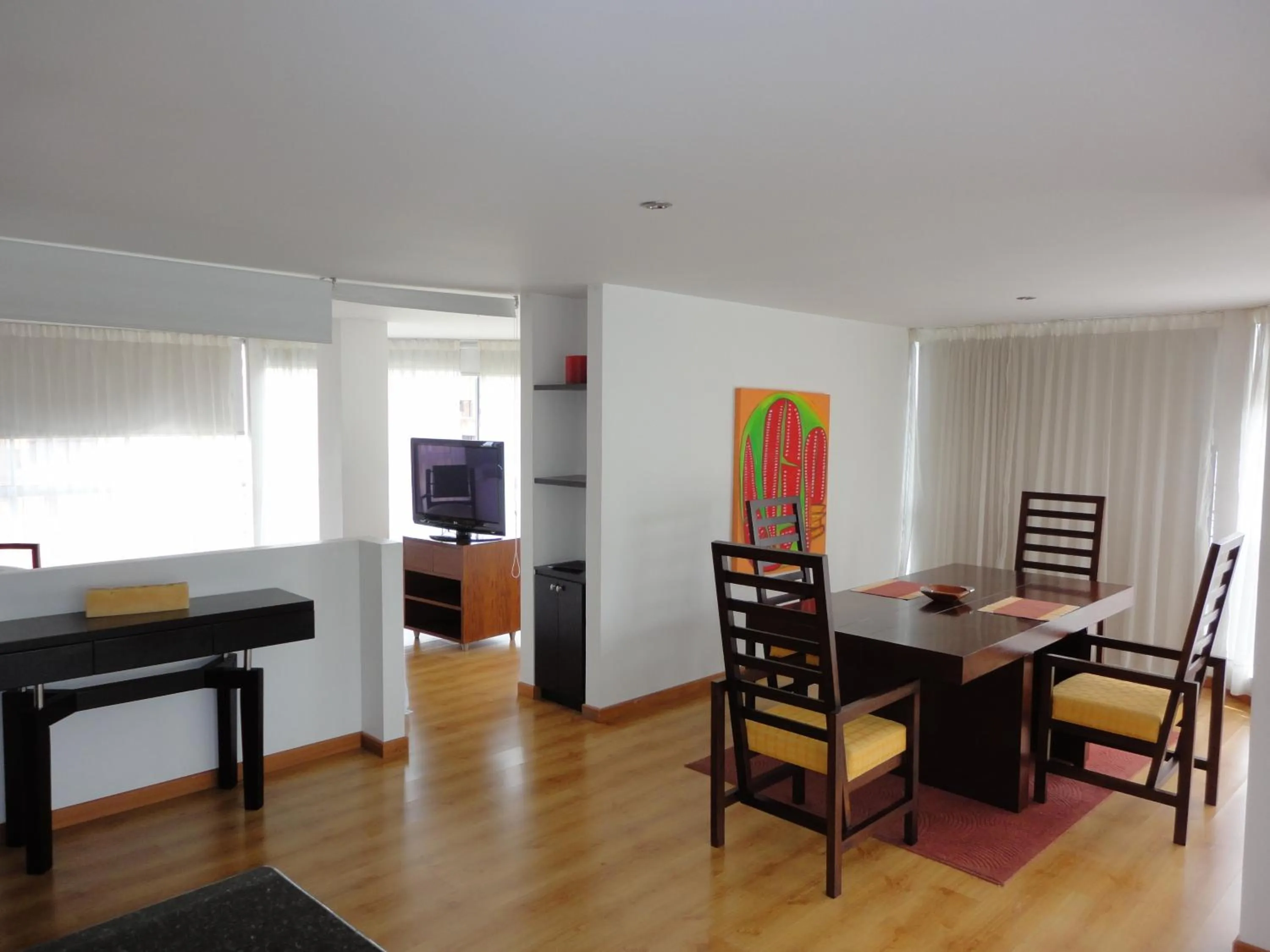 Communal lounge/ TV room in Monterosa Apartamentos Amoblados