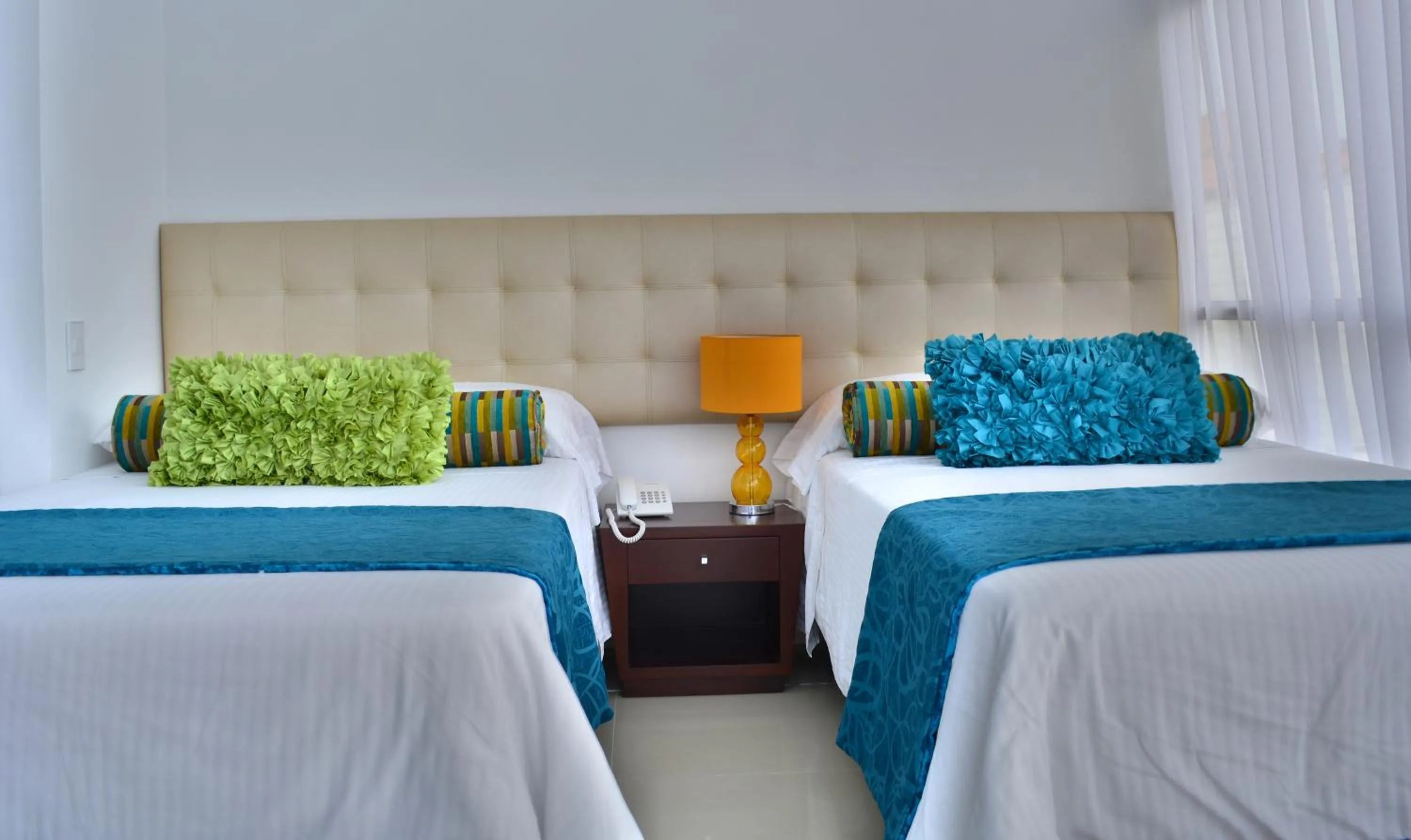 Bed in Monterosa Apartamentos Amoblados