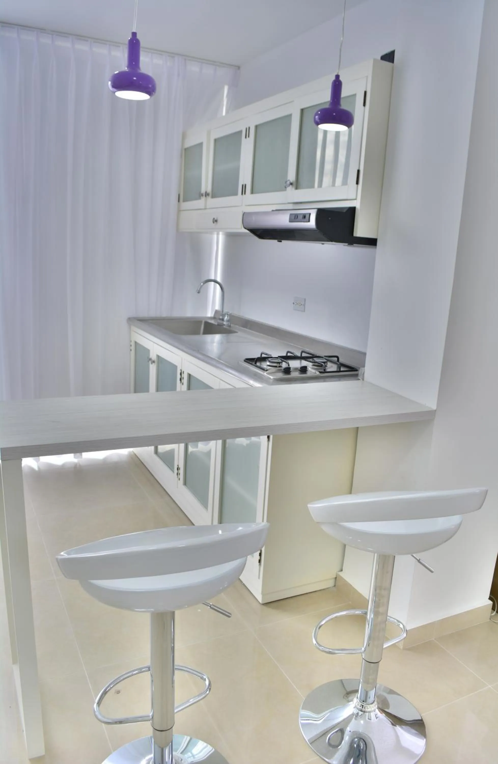 Kitchen or kitchenette in Monterosa Apartamentos Amoblados