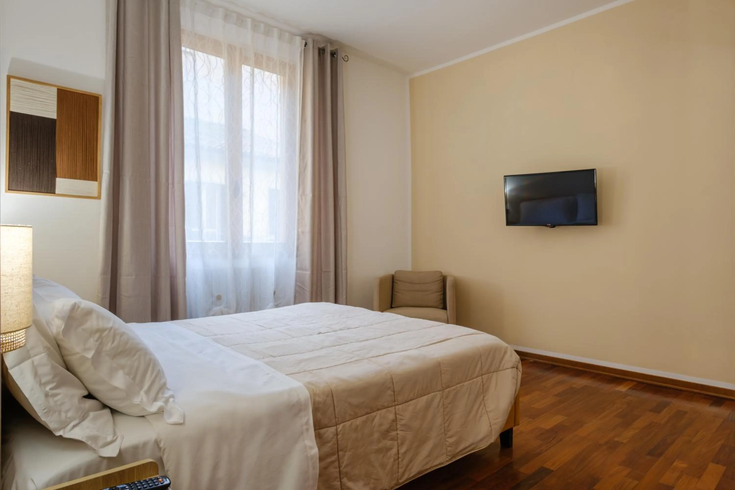 Bed in Residenza Ariosto by Studio Vita