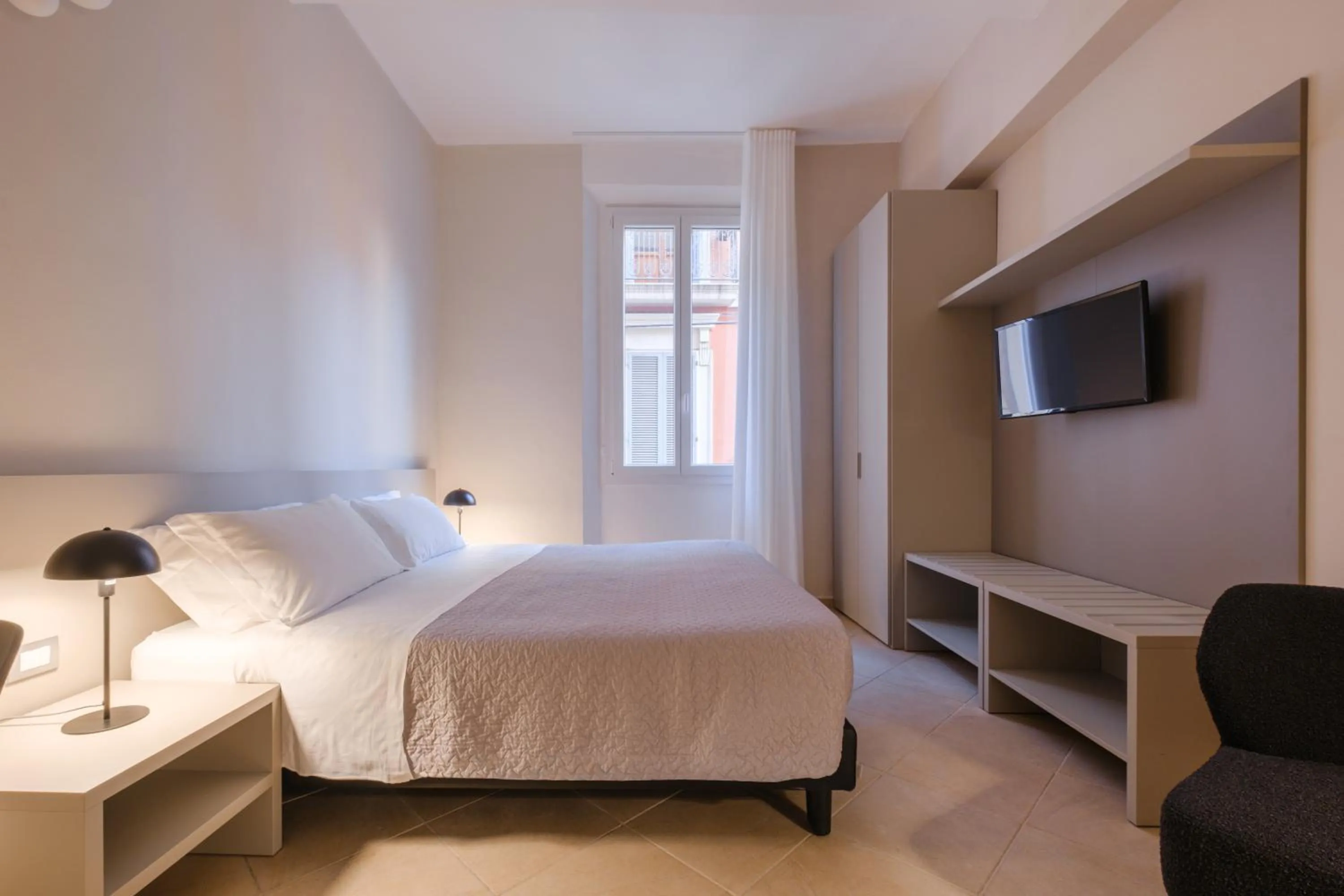 Bed in Residenza Ariosto by Studio Vita