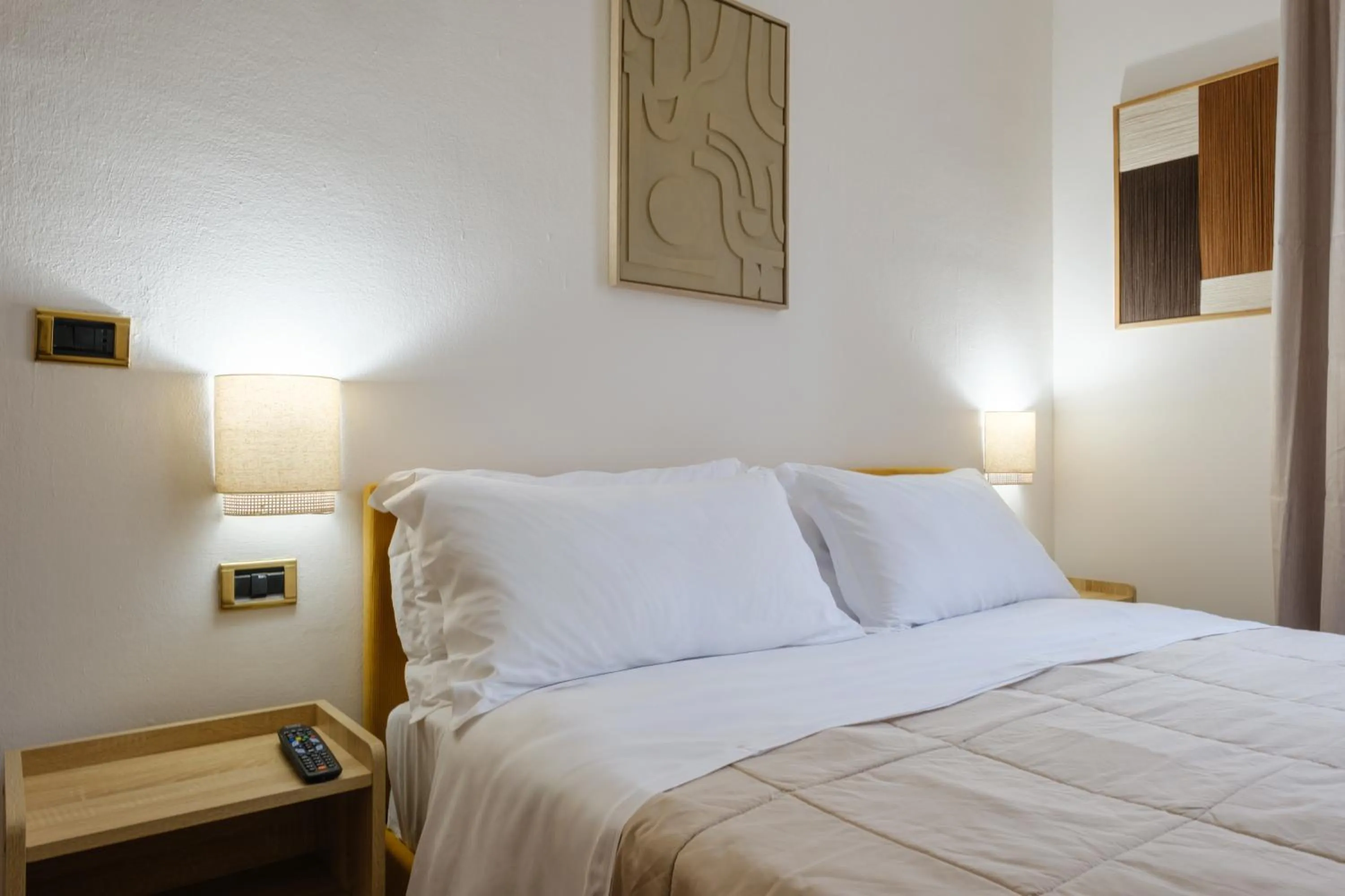 Bed in Residenza Ariosto by Studio Vita