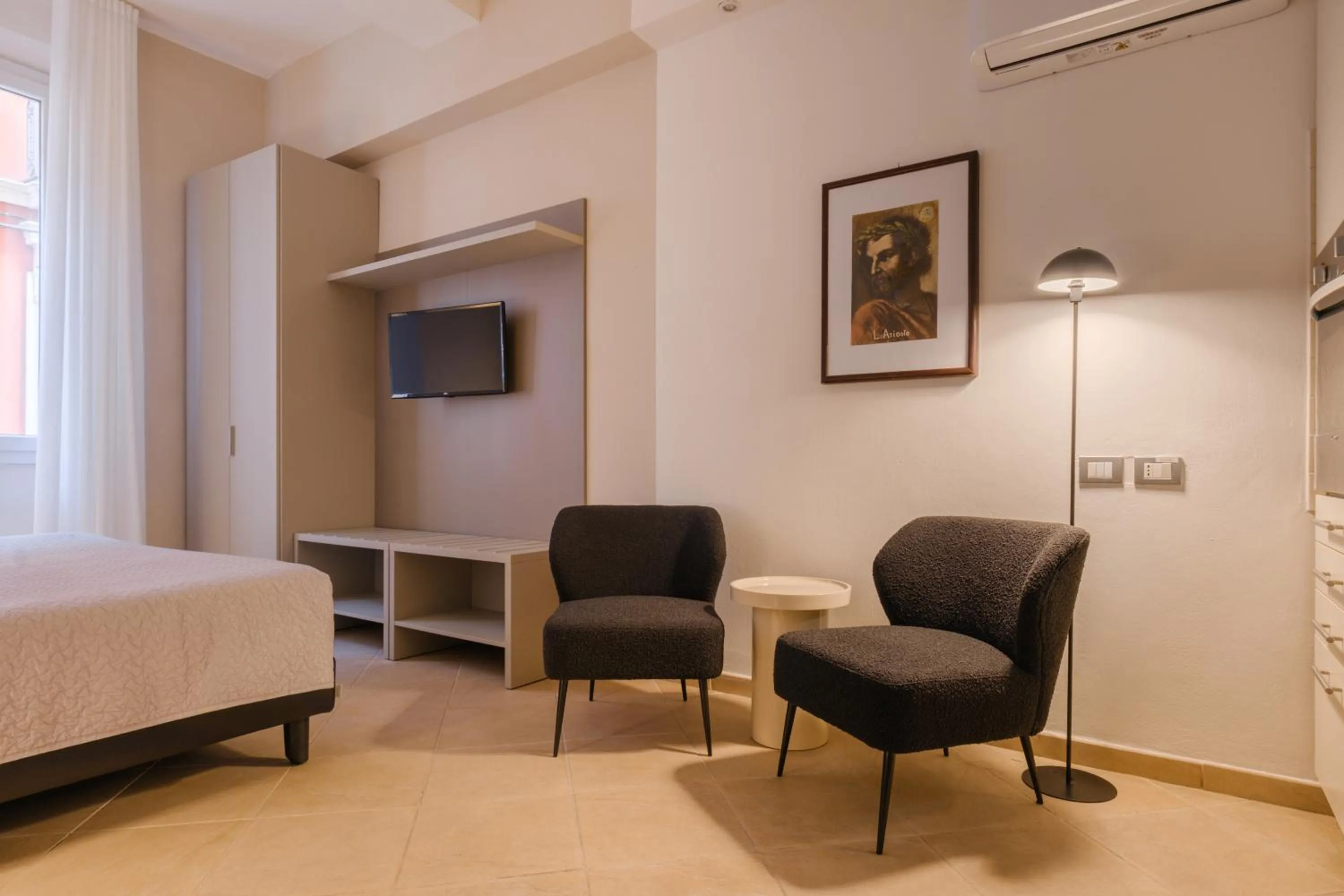 Bed in Residenza Ariosto by Studio Vita