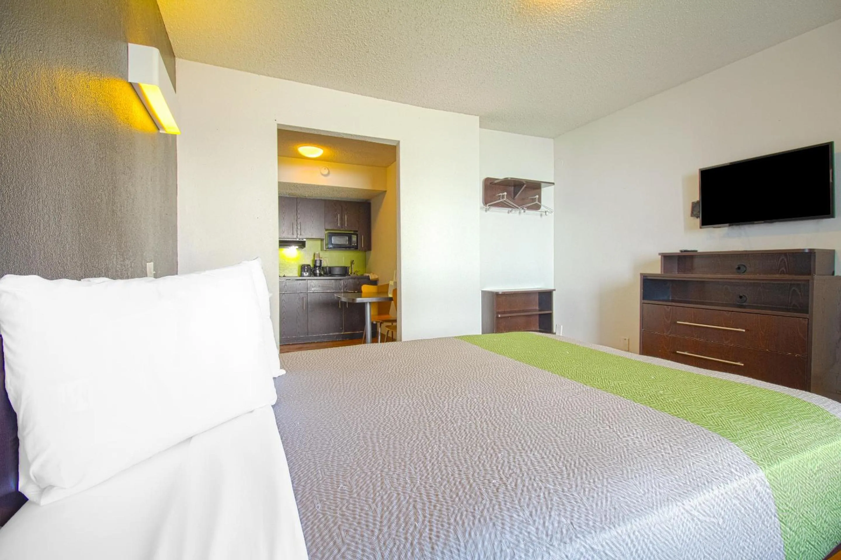 Bedroom in Studio Inn Extended Stay Oklahoma City Airport by OYO