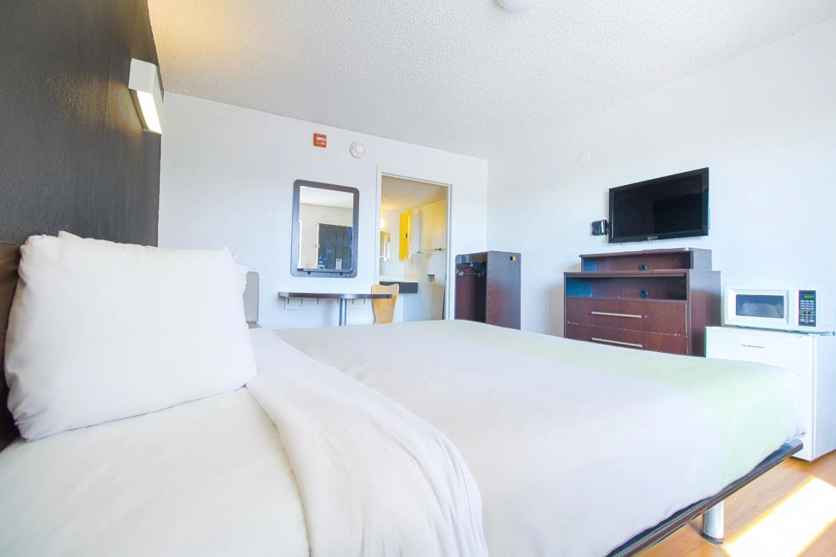 Bedroom in Studio Inn Extended Stay Oklahoma City Airport by OYO