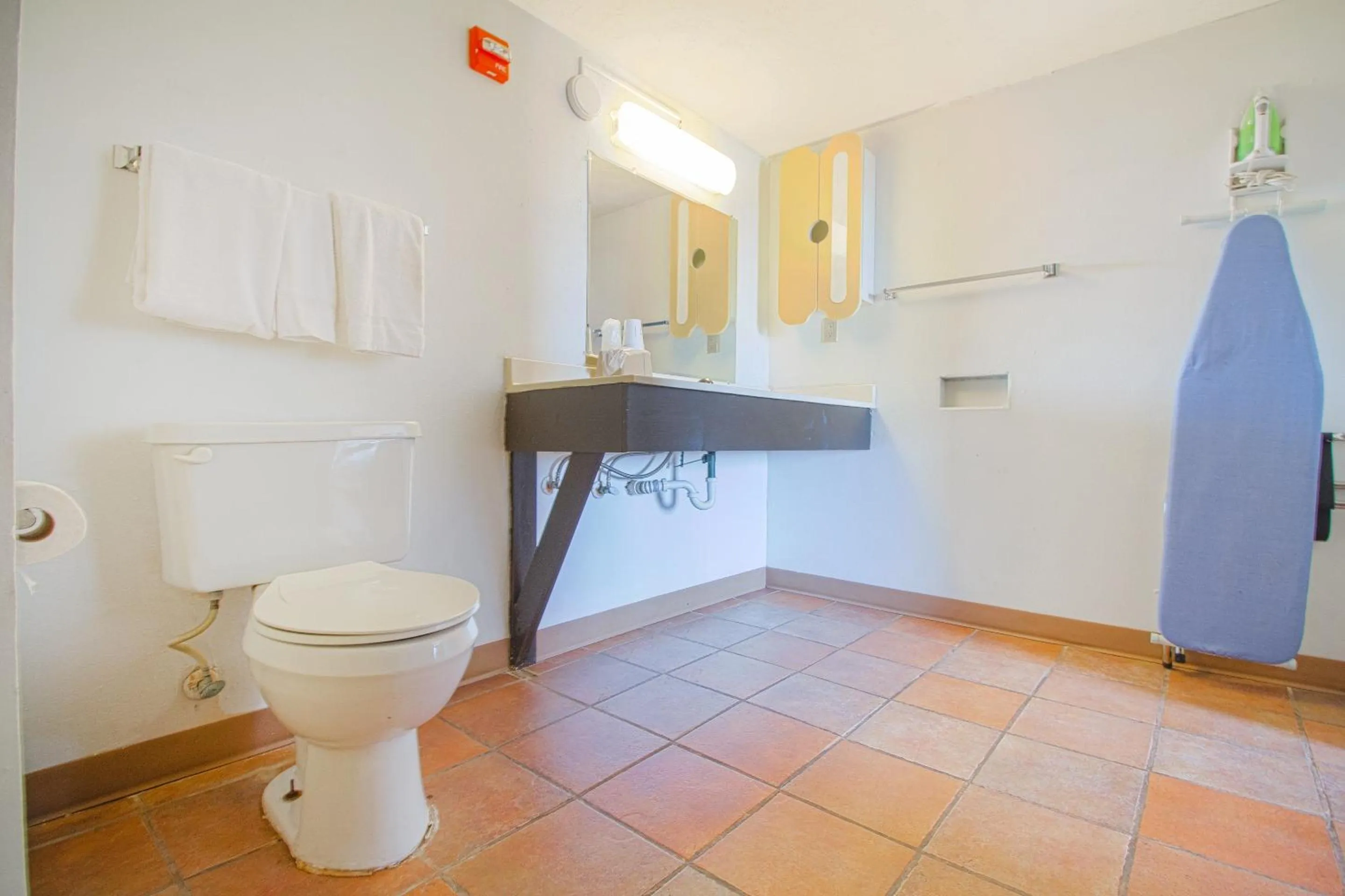 Bathroom in Studio Inn Extended Stay Oklahoma City Airport by OYO