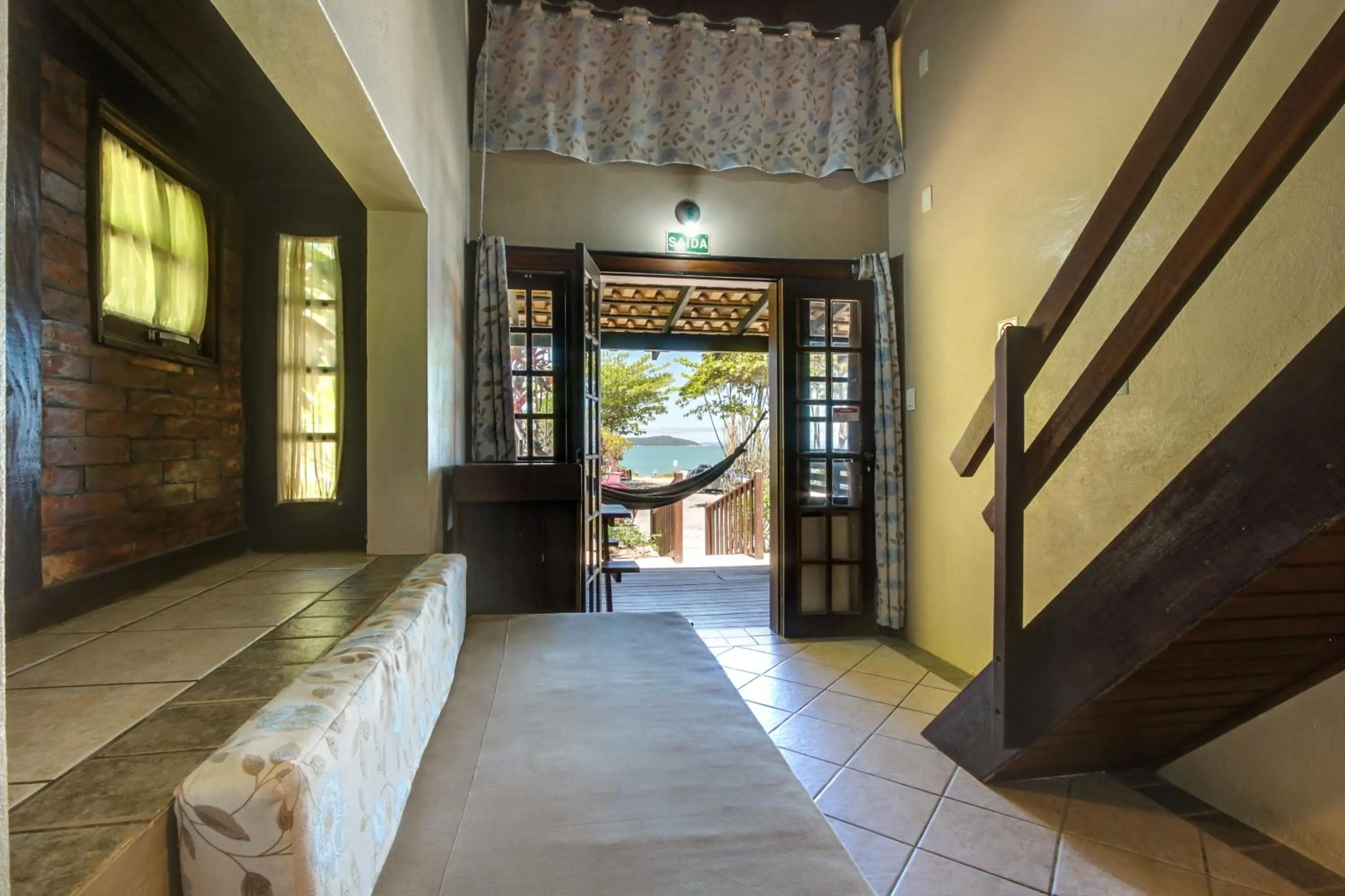 Communal lounge/ TV room, Bed in Pousada dos Ingleses