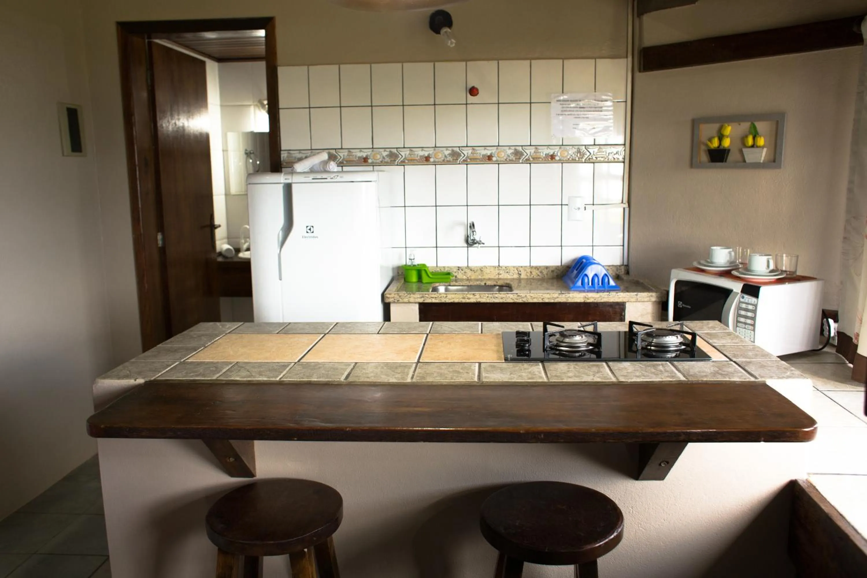 Kitchen or kitchenette in Pousada dos Ingleses