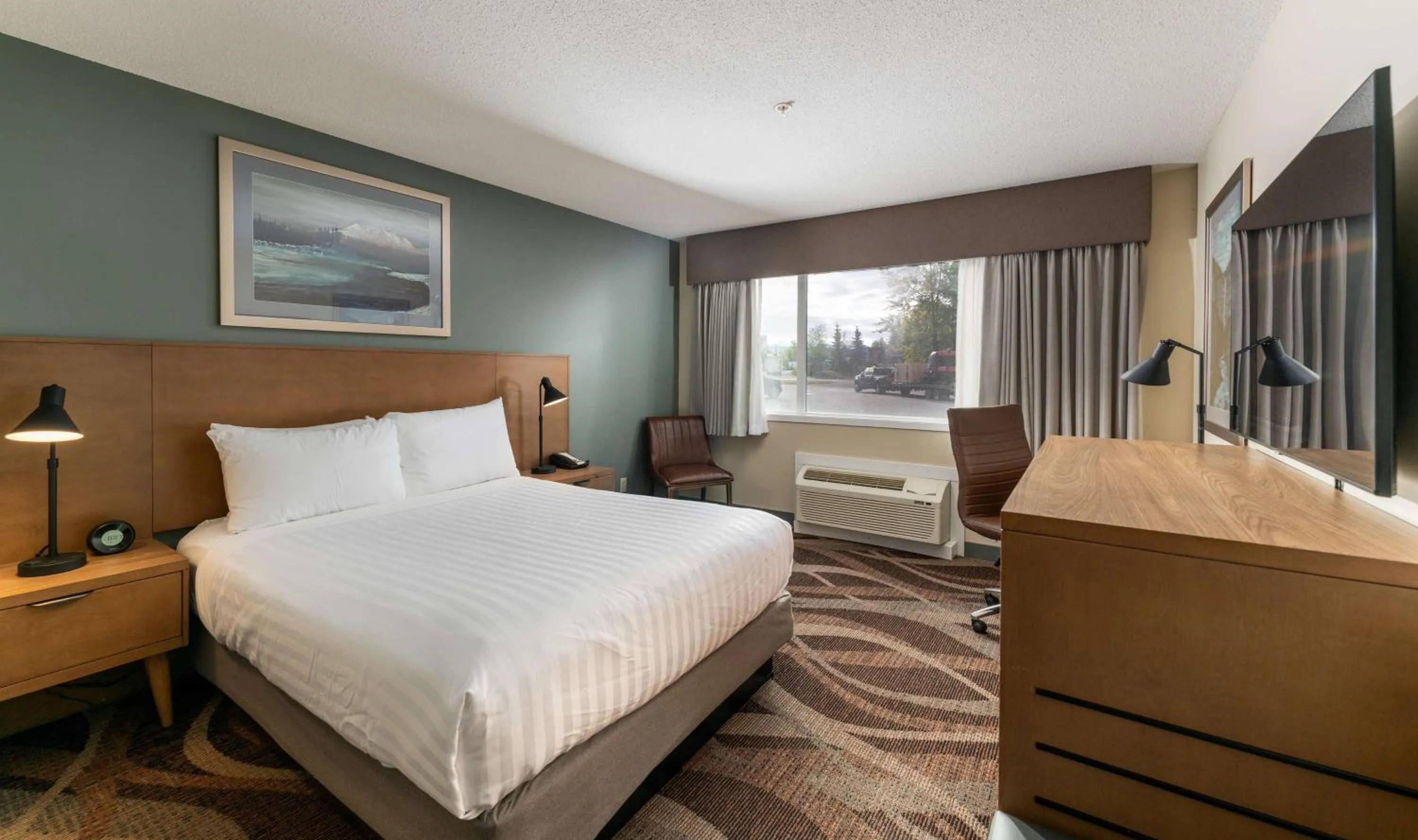 Bedroom, Bed in Prestige Hudson Bay Lodge & Conference Centre, WorldHotels Crafted Collection