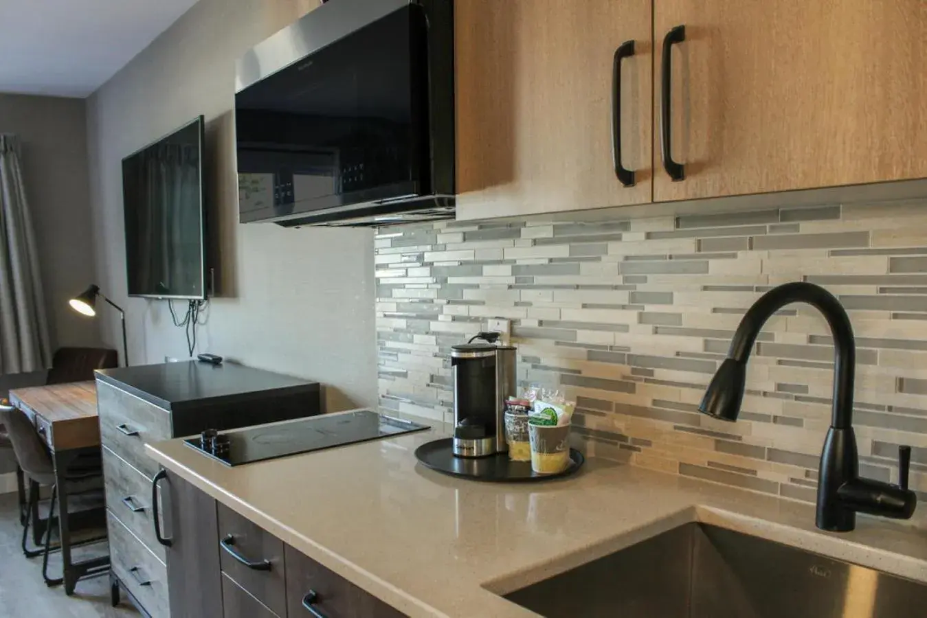 Queen Room with Mountain View and Kitchenette - Non-Smoking in Prestige Hudson Bay Lodge & Conference Centre, WorldHotels Crafted Collection Queen Room with Mountain View and Kitchenette - Non-Smoking in Prestige Hudson Bay Lodge & Conference Centre, WorldHotels Crafted Collection