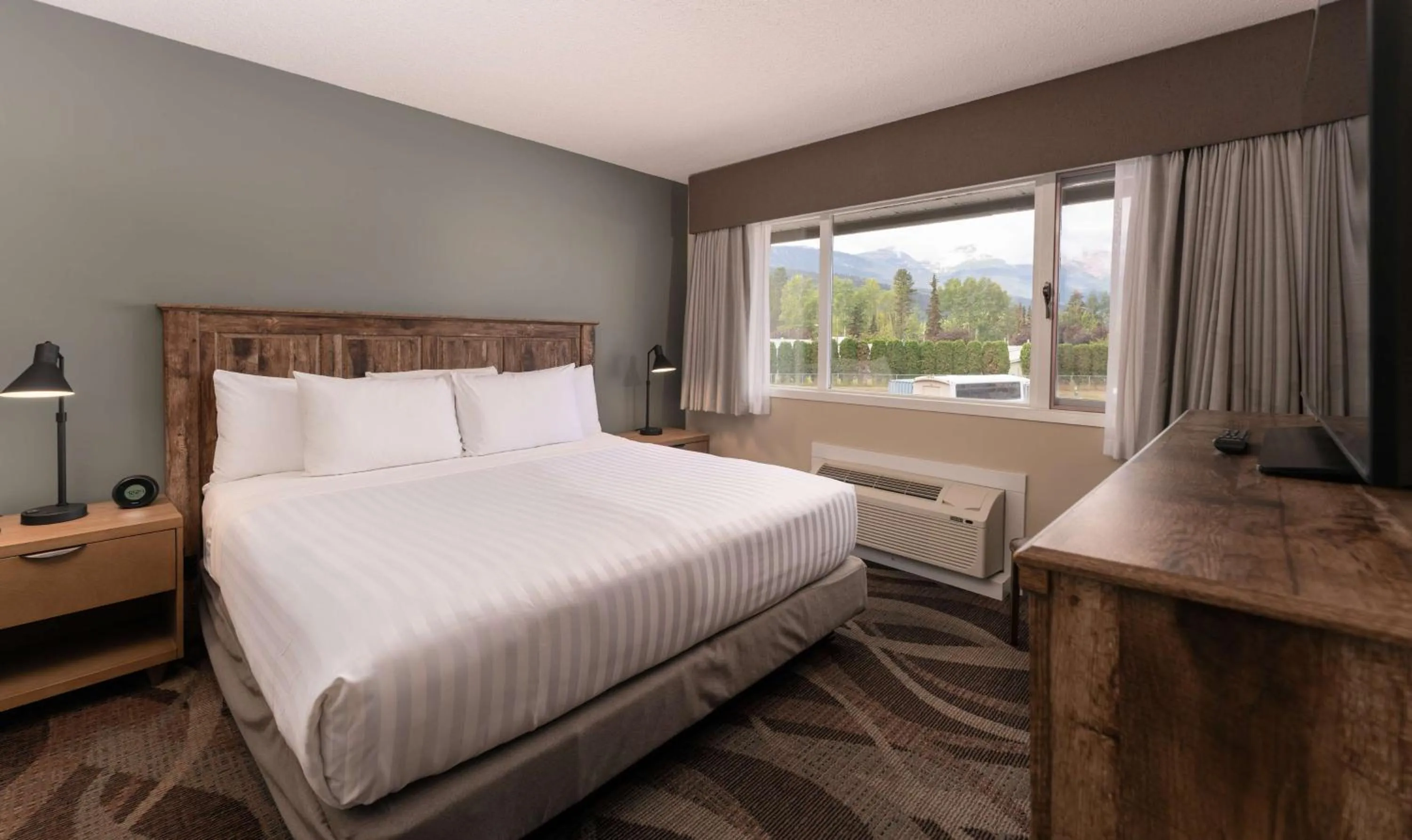 Photo of the whole room, Bed in Prestige Hudson Bay Lodge & Conference Centre, WorldHotels Crafted Collection