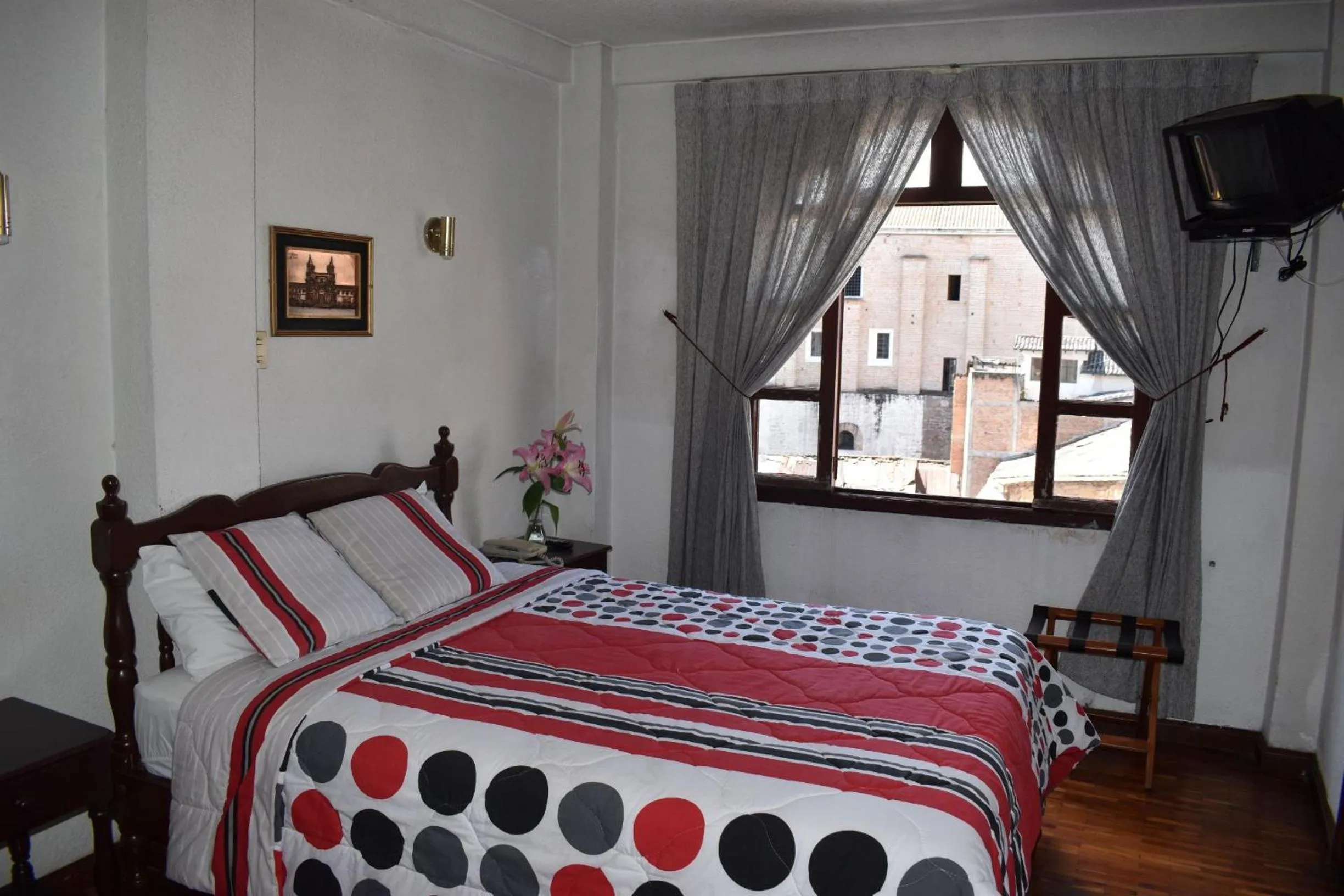 TV and multimedia, Bed in Hotel Huasi Continental