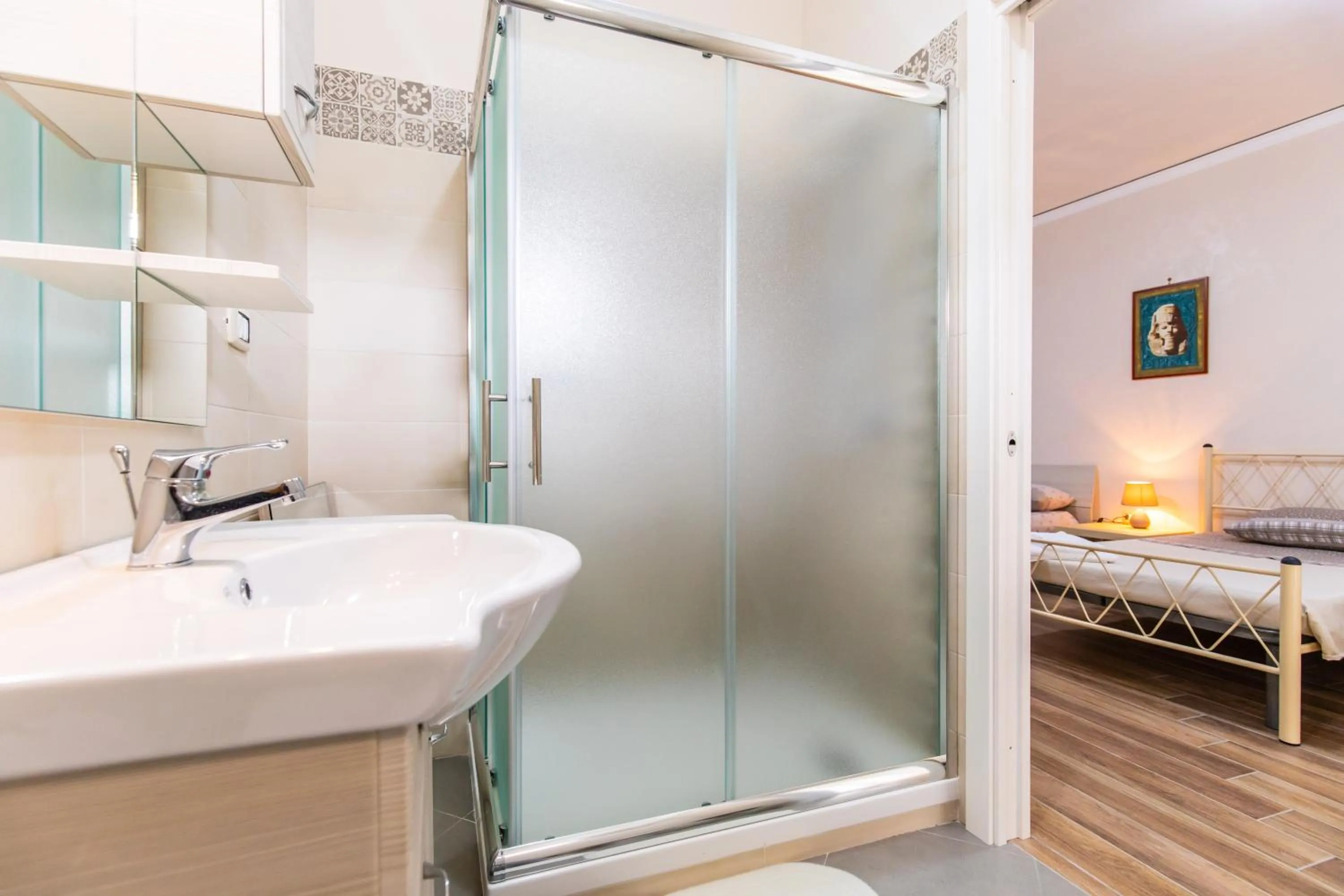 Shower, Bed in Casa di Annarella