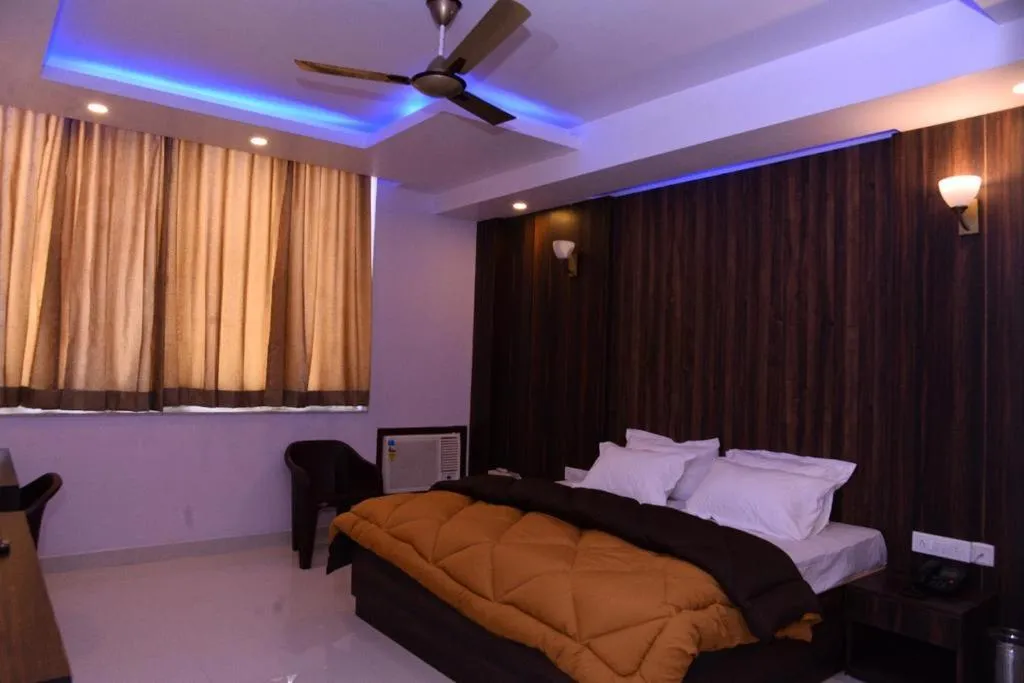 Bed in The Ravindram Hotel