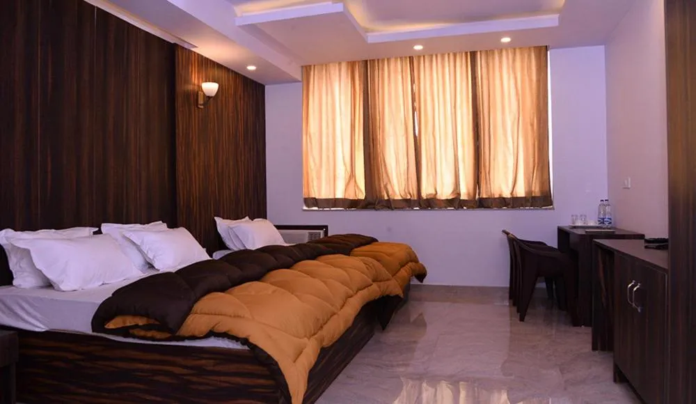 Bedroom, Bed in The Ravindram Hotel