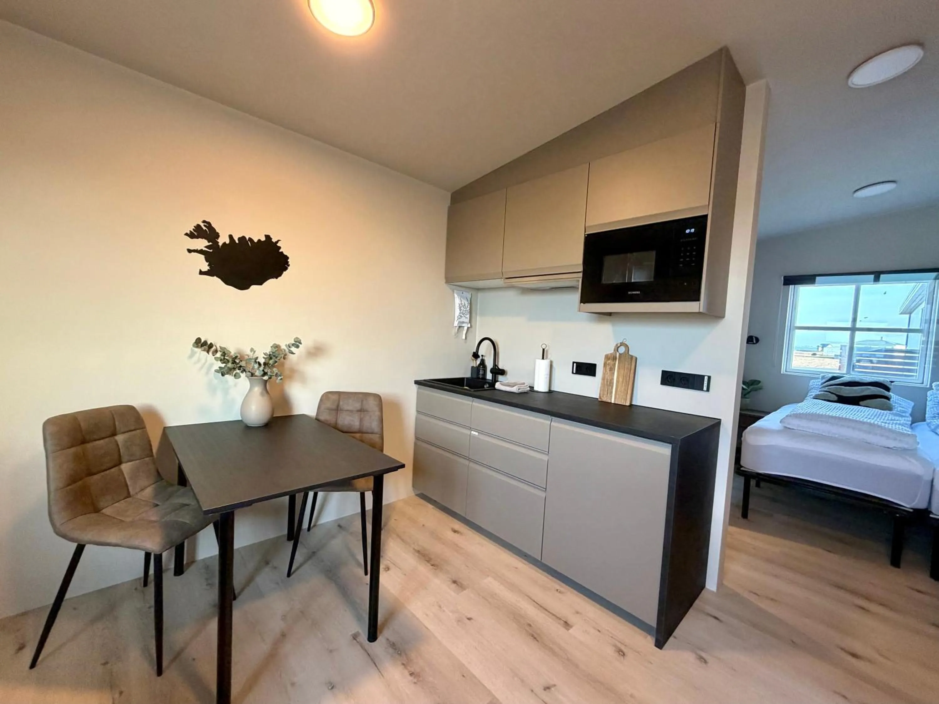 Bed in Garður Apartments