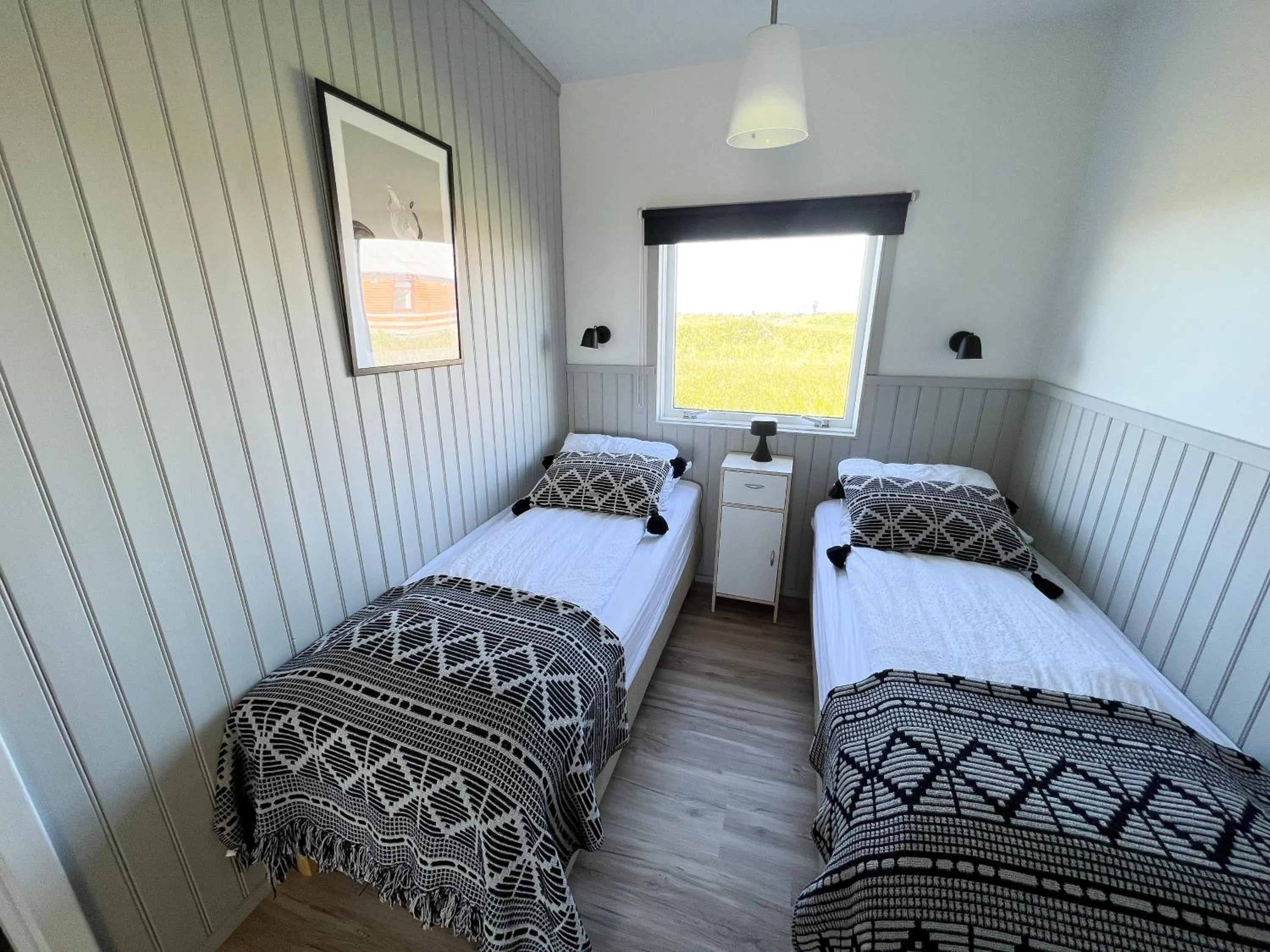 Bed in Garður Apartments