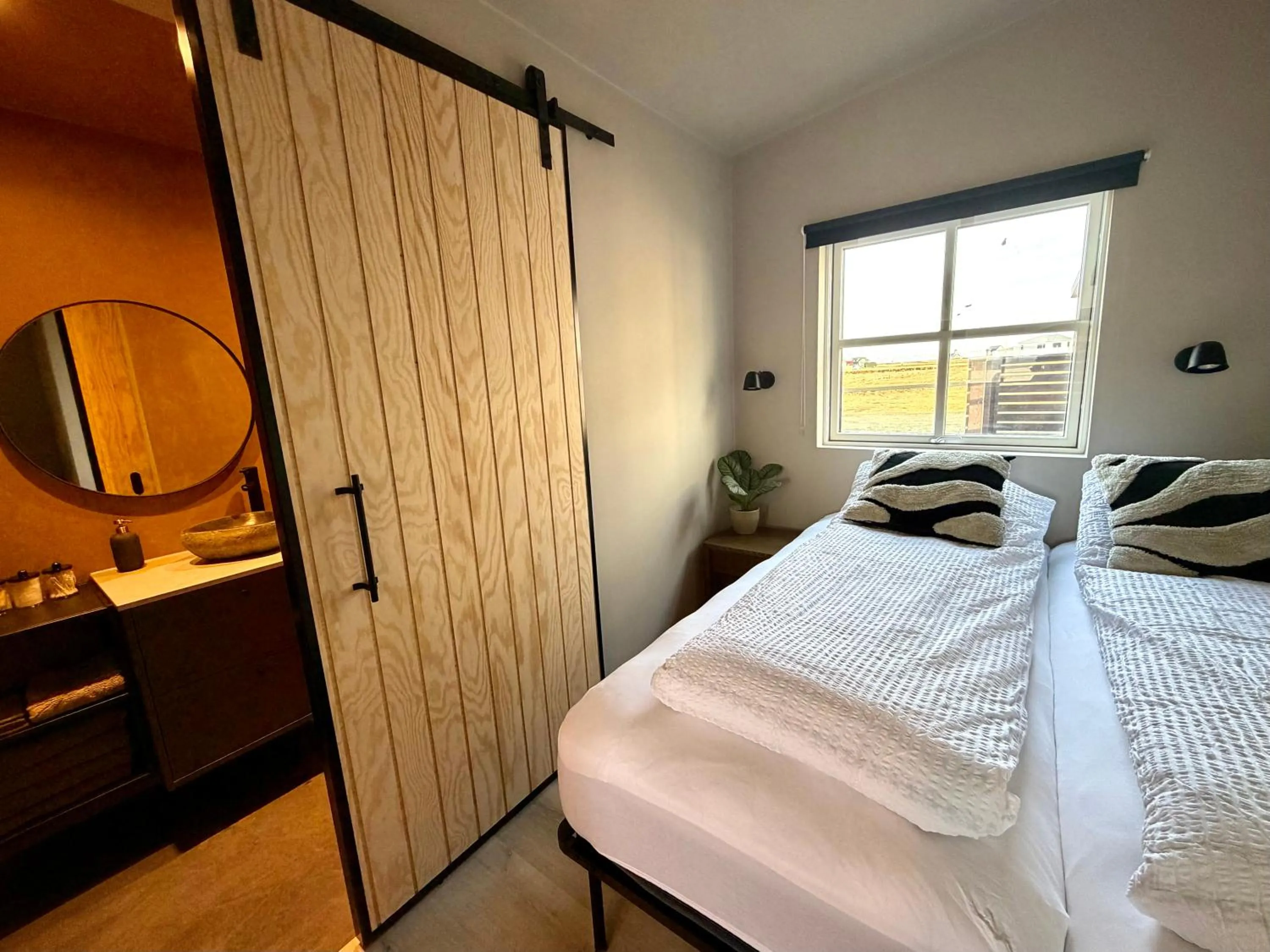 Bed in Garður Apartments