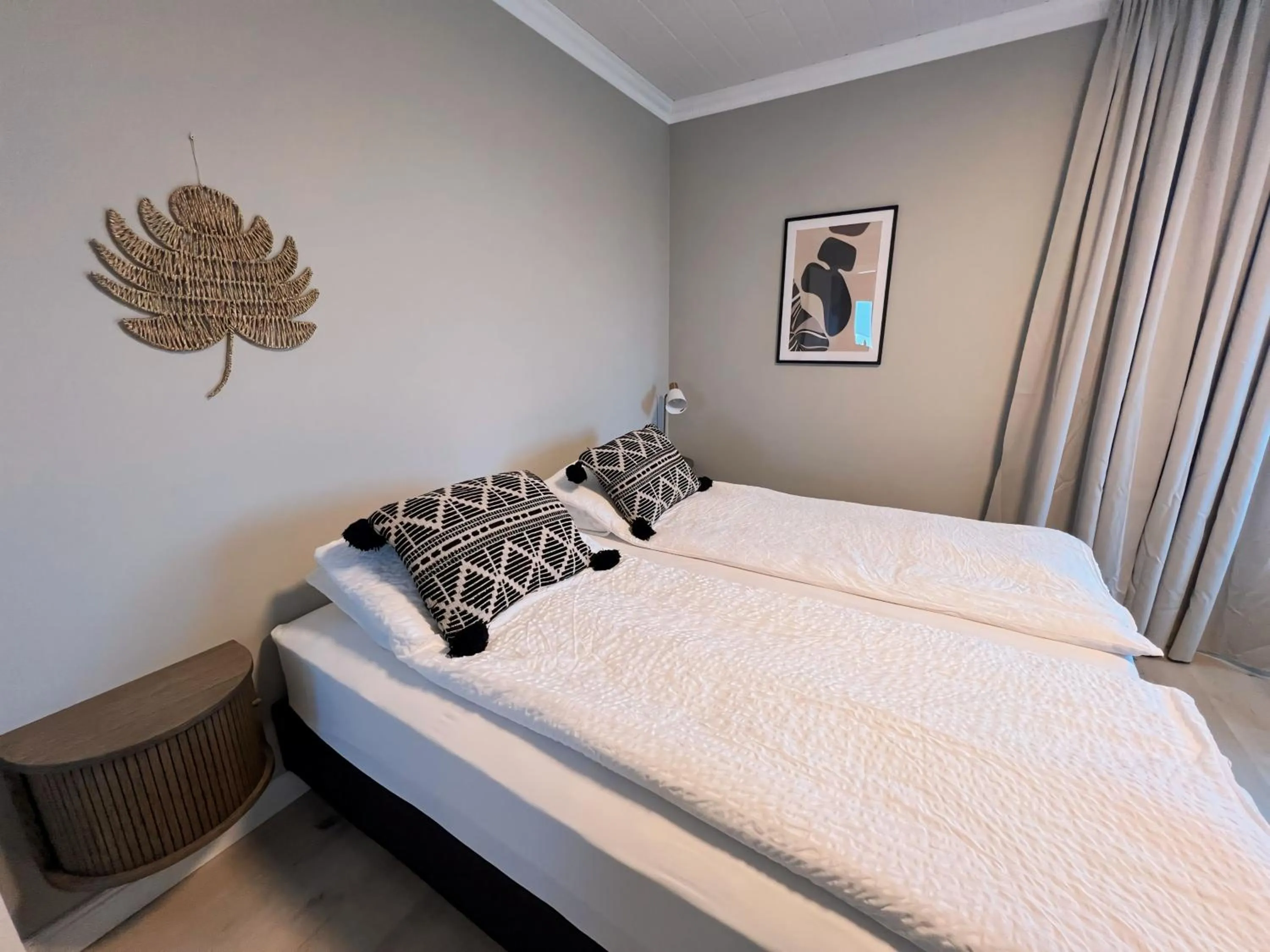 Bed in Garður Apartments