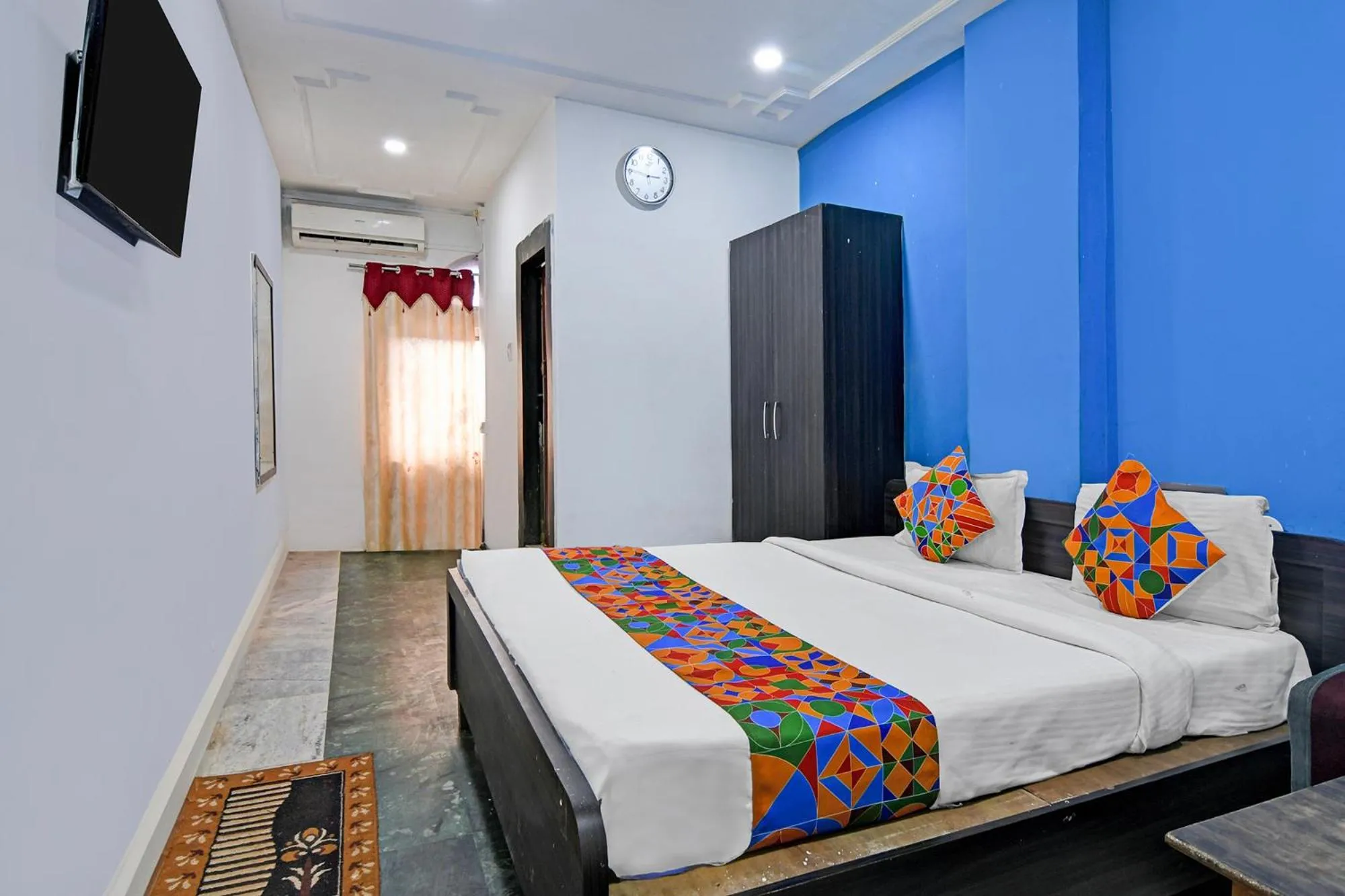 Bed in FabHotel Sai Sagar Residency