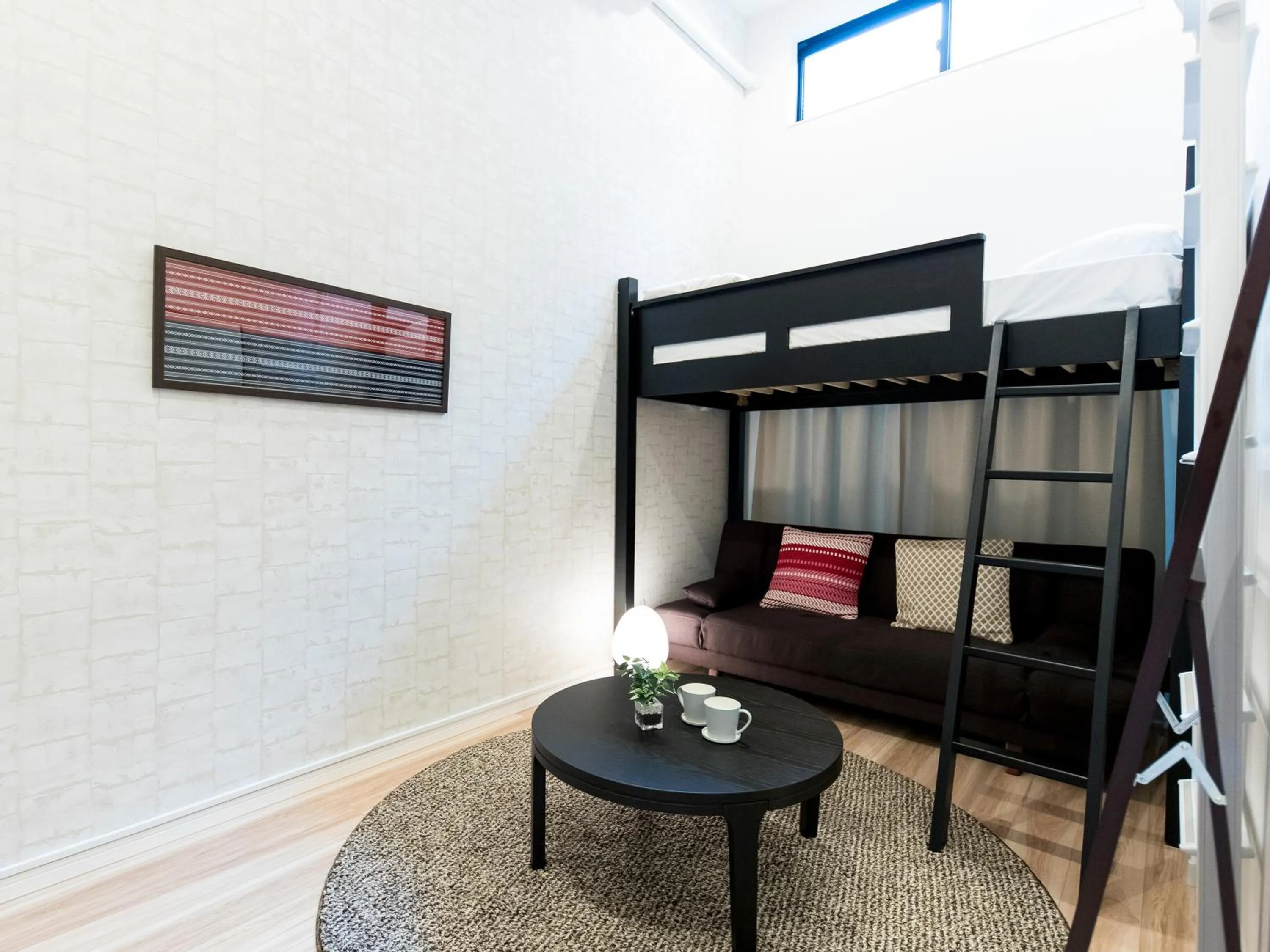 Bed in TRIP POD TAKASAGO B